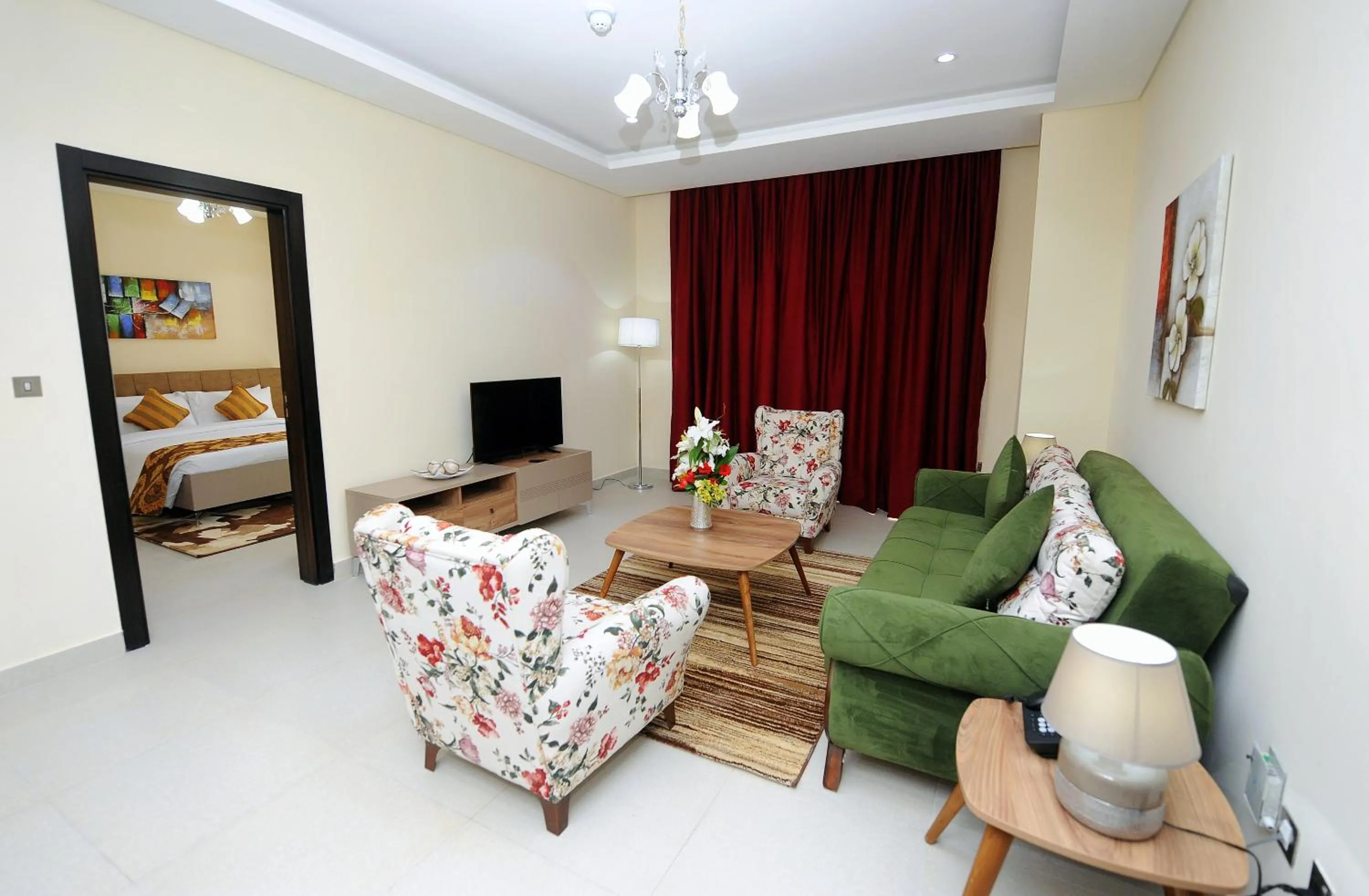 Living room, Bed in Al Mansour Park Inn Hotel&Apartment
