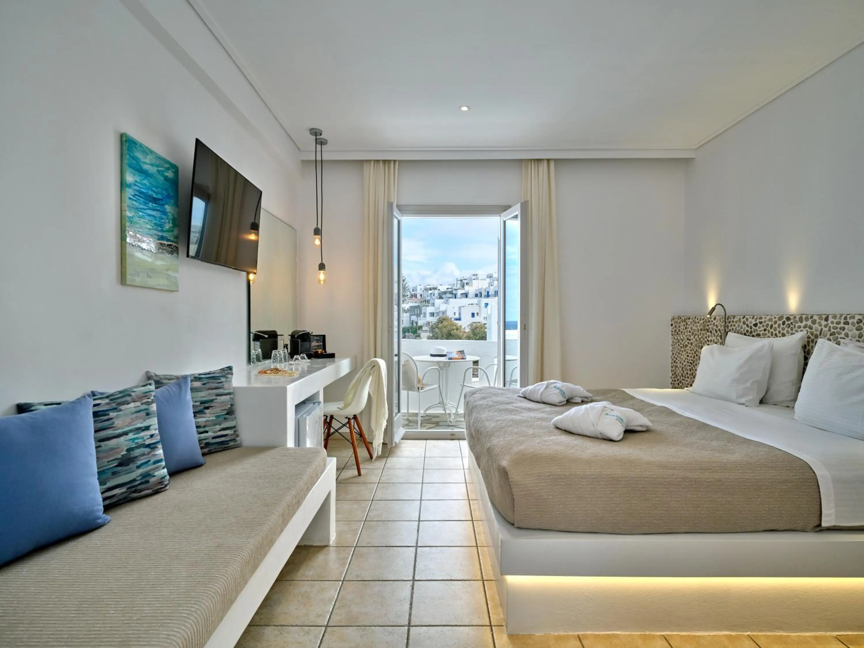 Bed in Kanale's Rooms & Suites