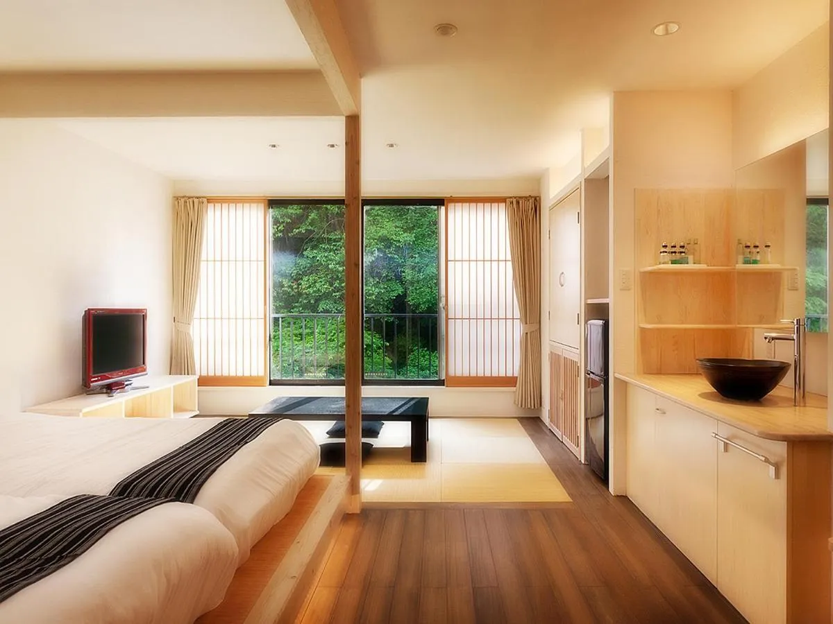 Photo of the whole room, Bed in Shosuke-no-Yado Takinoyu