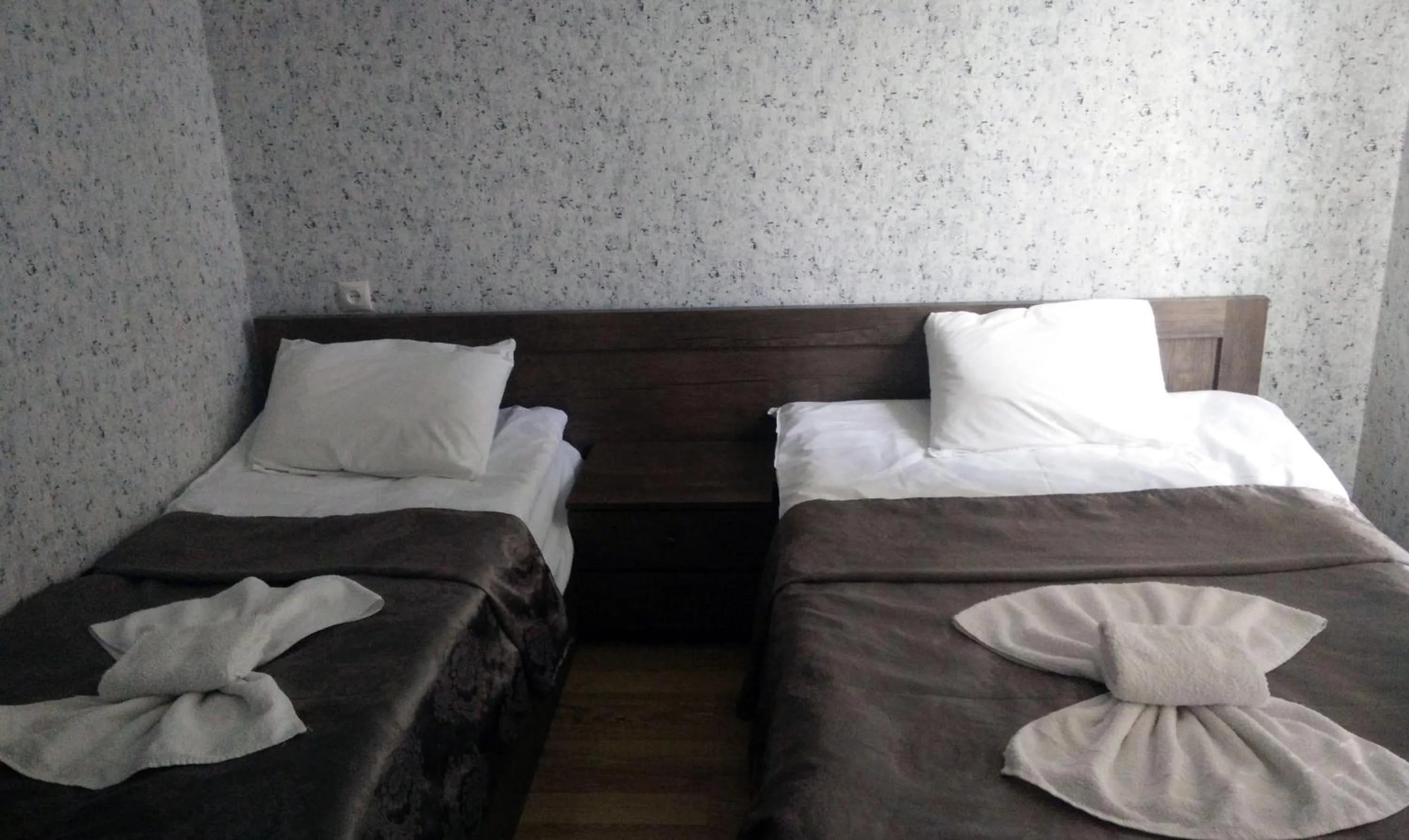 Bed in Hotel Mimino