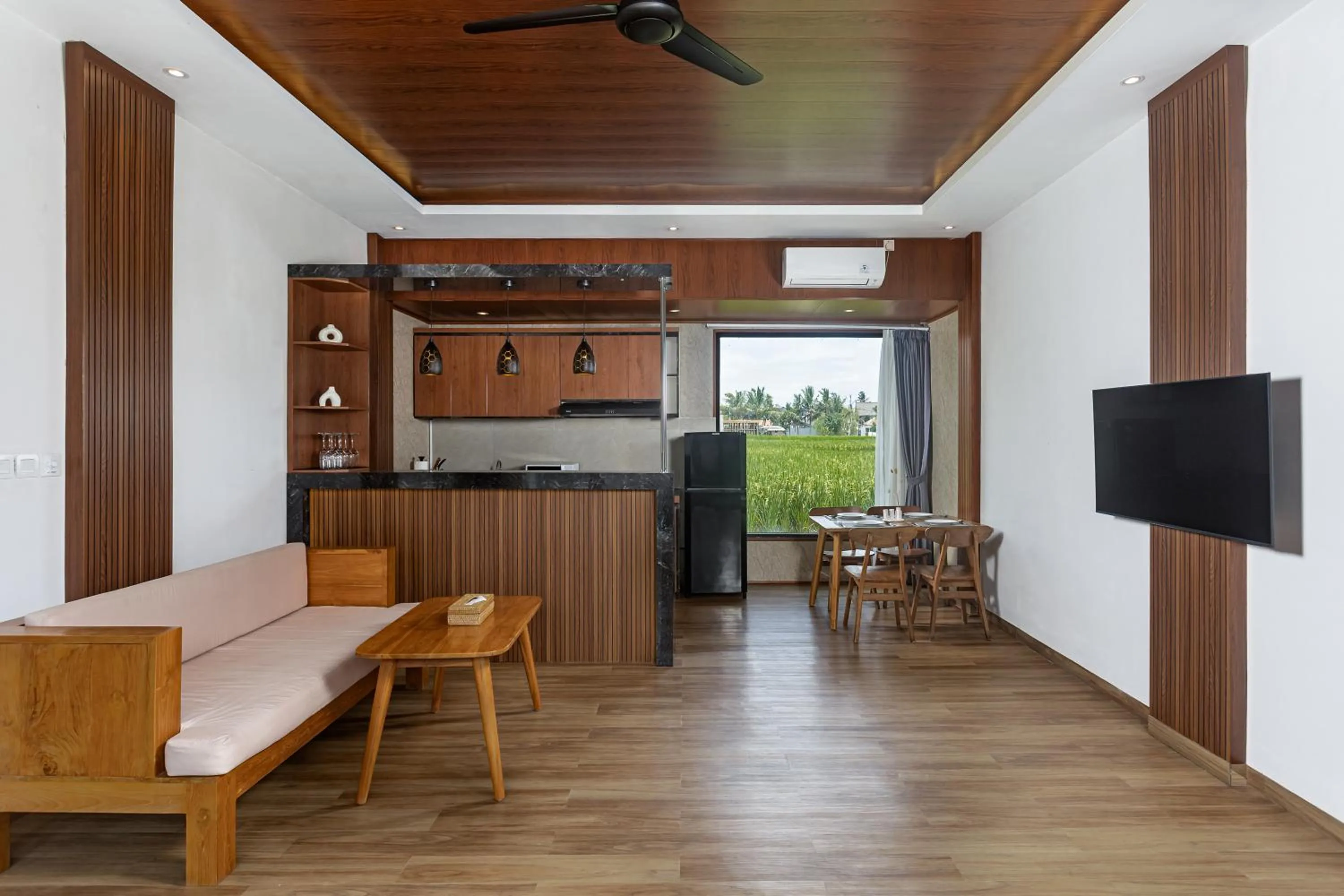 Communal lounge/ TV room in Ubud Lestari Villa