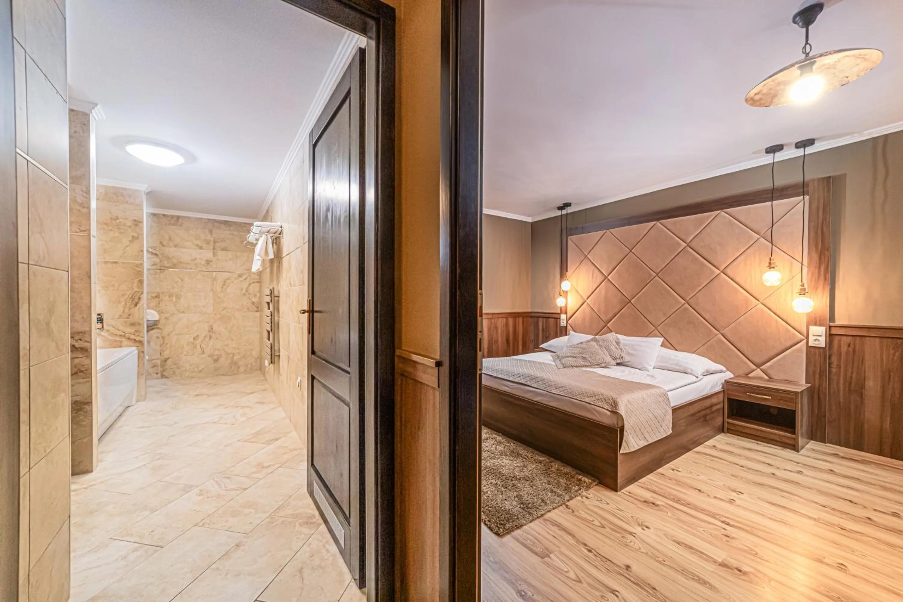 Bathroom, Bed in Komló Hotel Gyula
