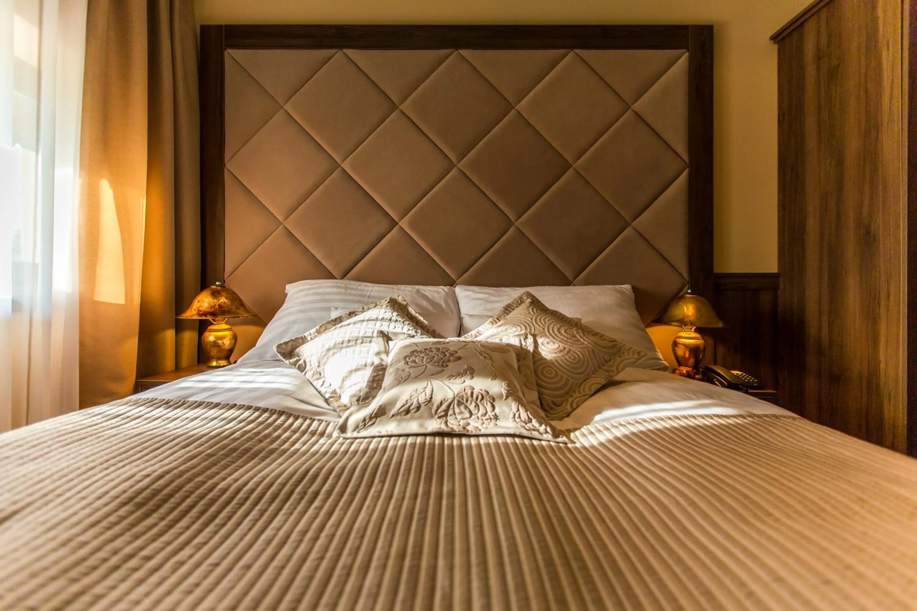 Bed in Komló Hotel Gyula