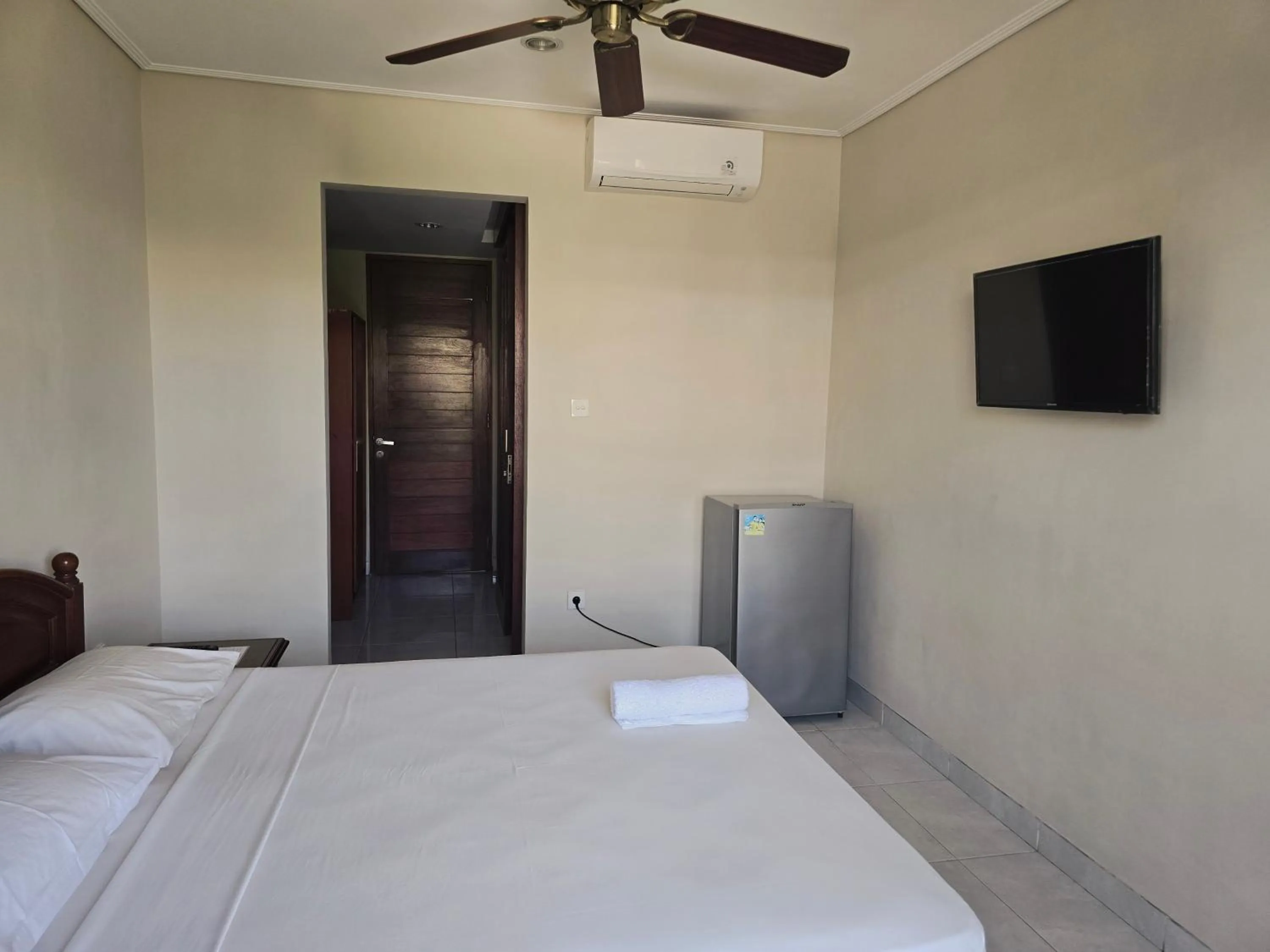 Bed in Keke Homestay Sanur
