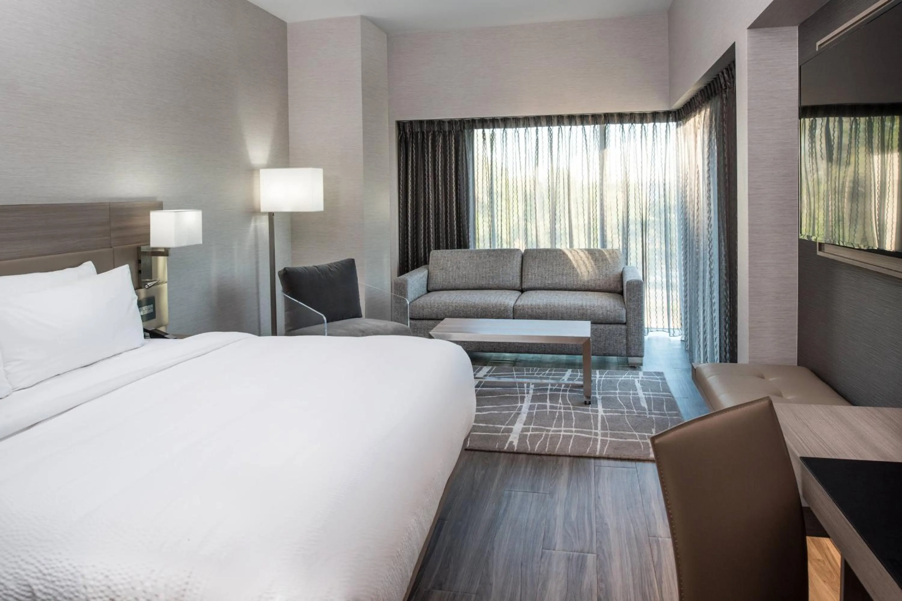 Photo of the whole room, Bed in AC Hotel by Marriott Boston Cambridge