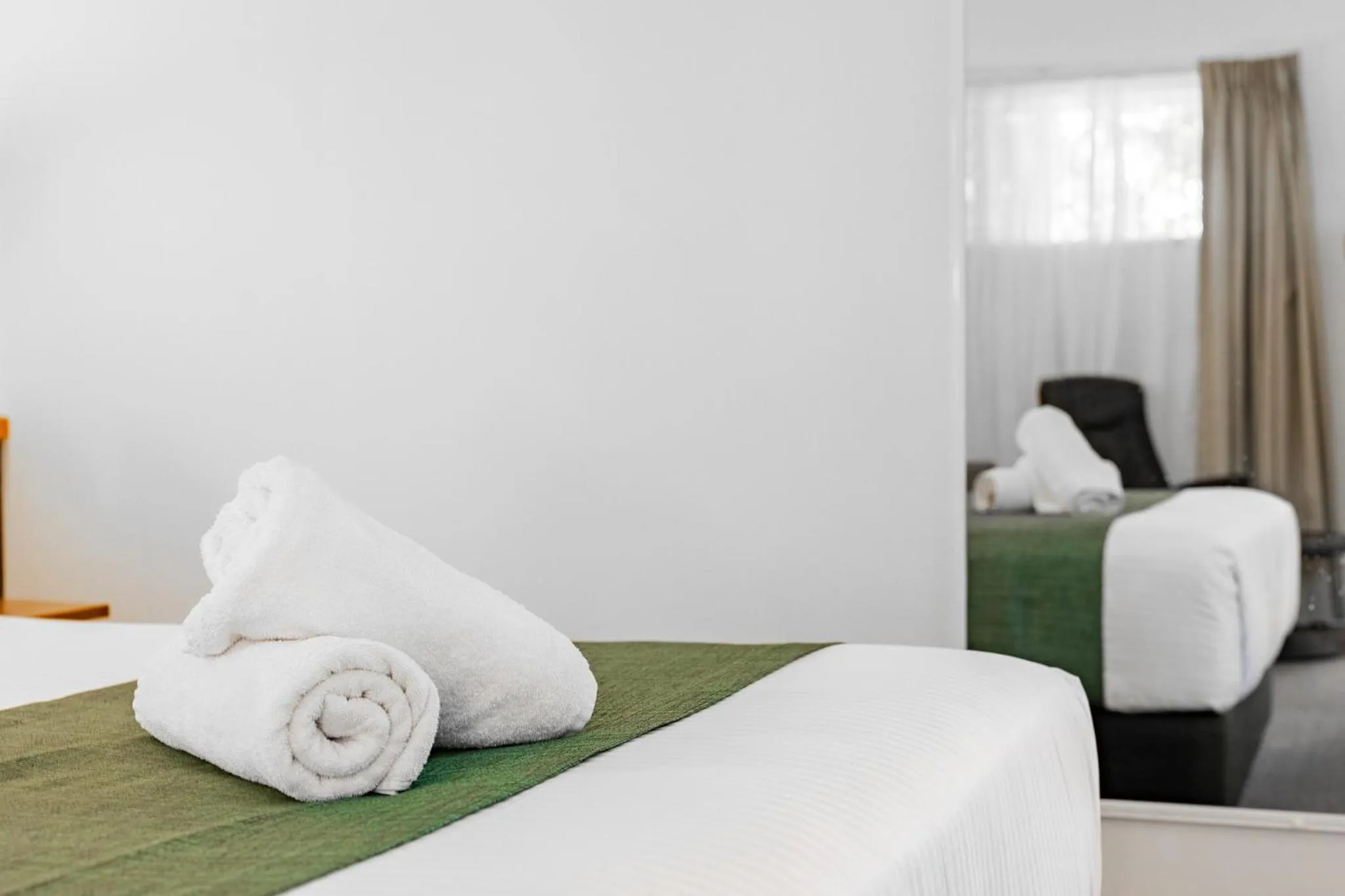 Bed in Maraboon Motor Inn