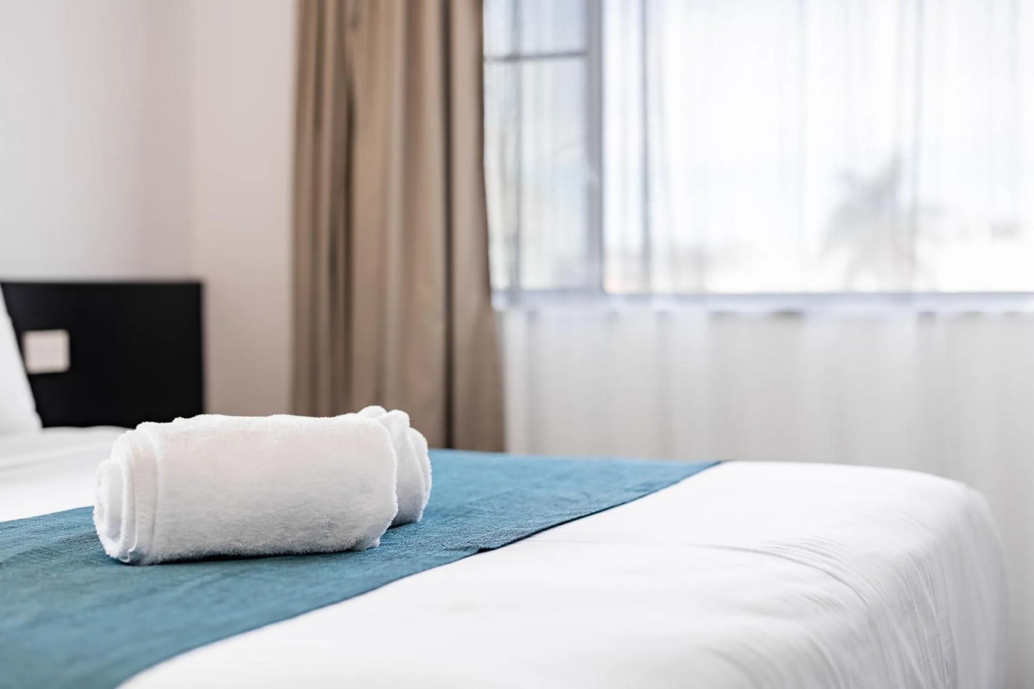 Bed in Maraboon Motor Inn