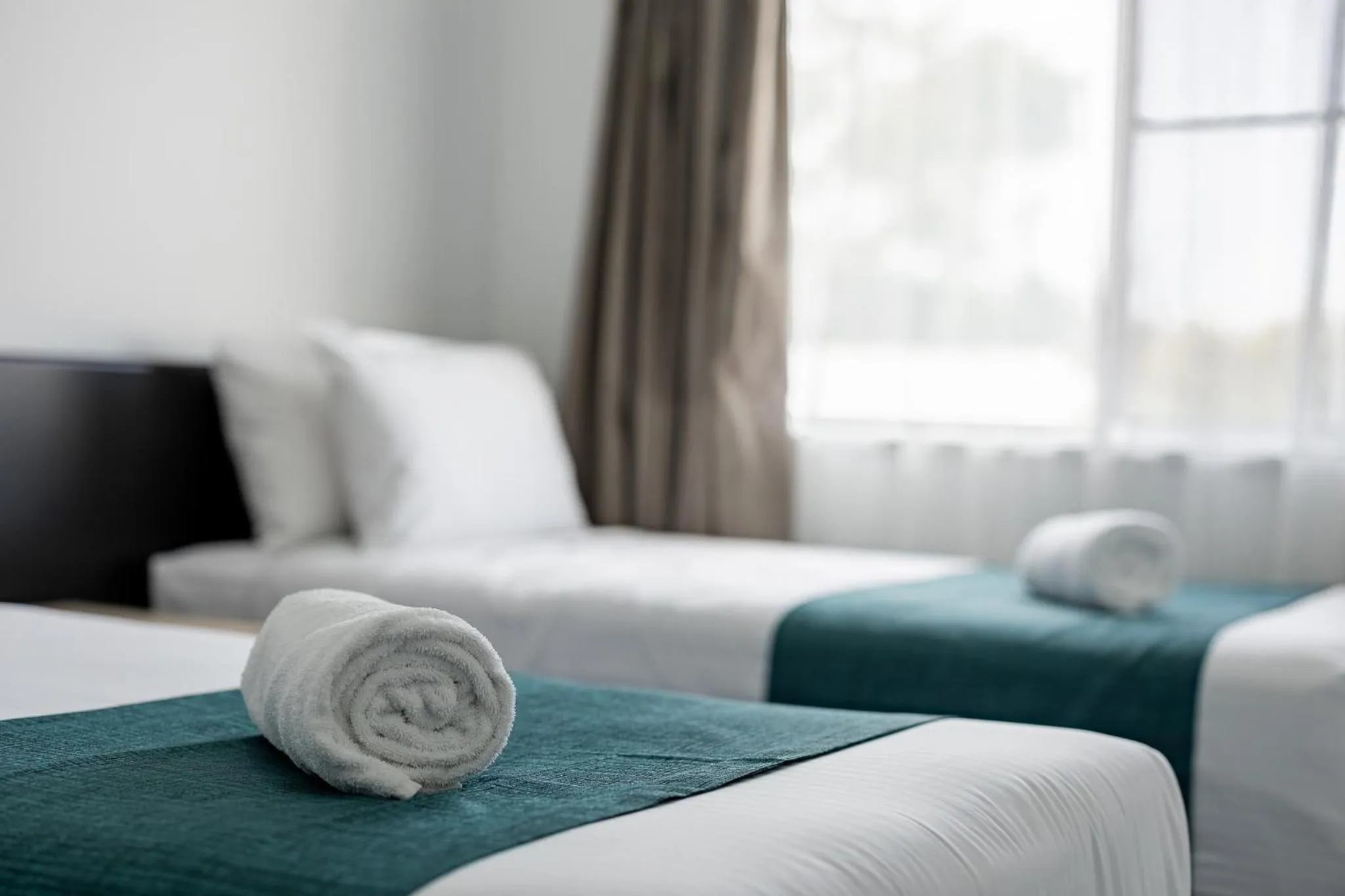 Bed in Maraboon Motor Inn