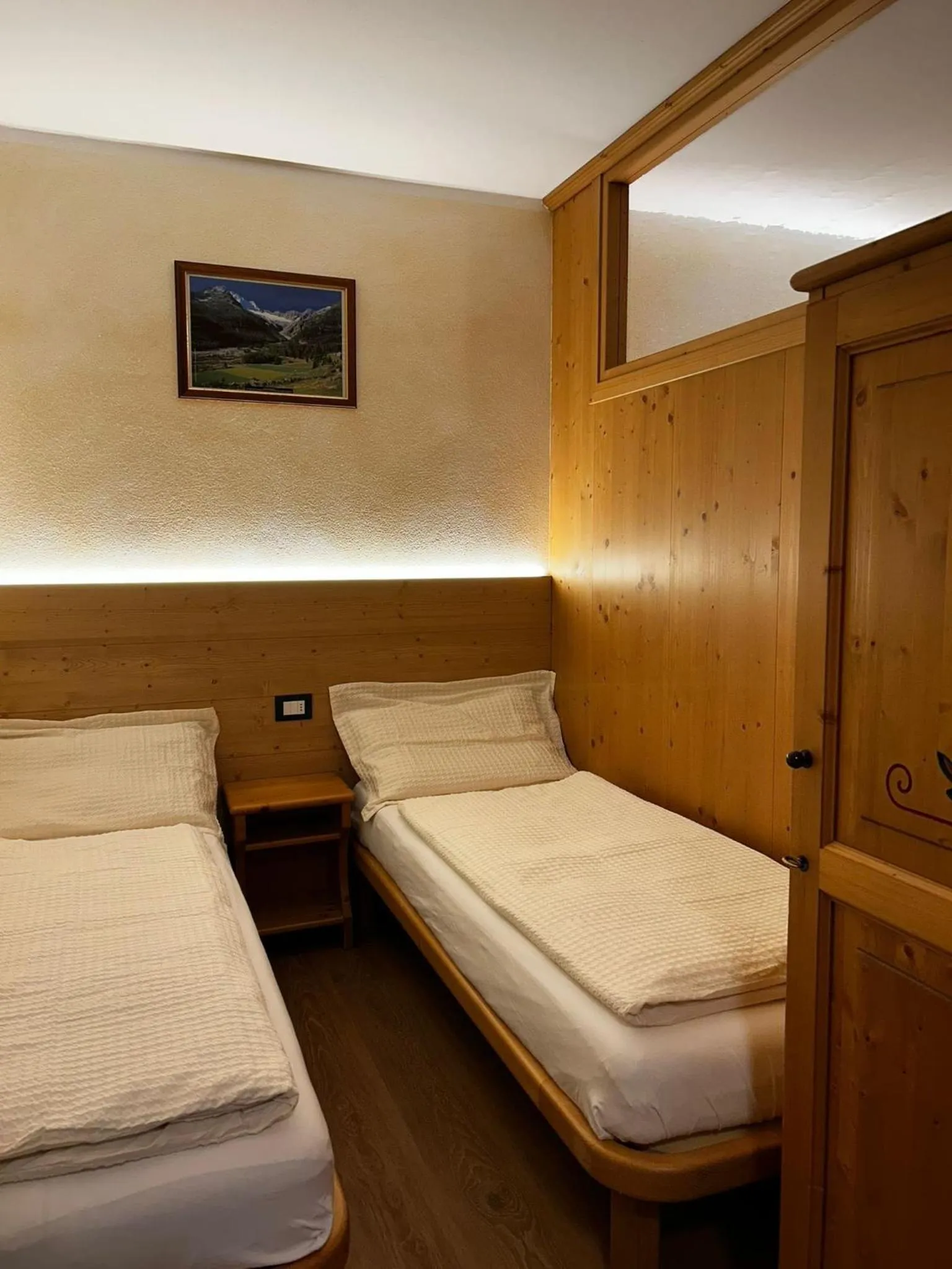 Bed in Rosengarden Alpine Residence