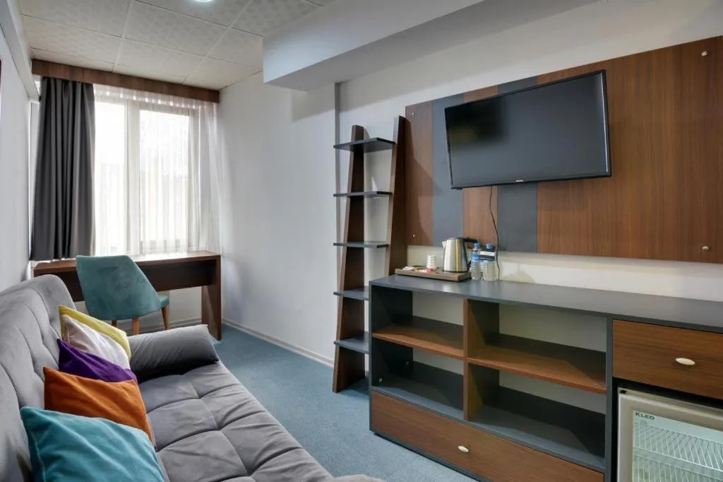 Communal lounge/ TV room in Grande Stella Hotel