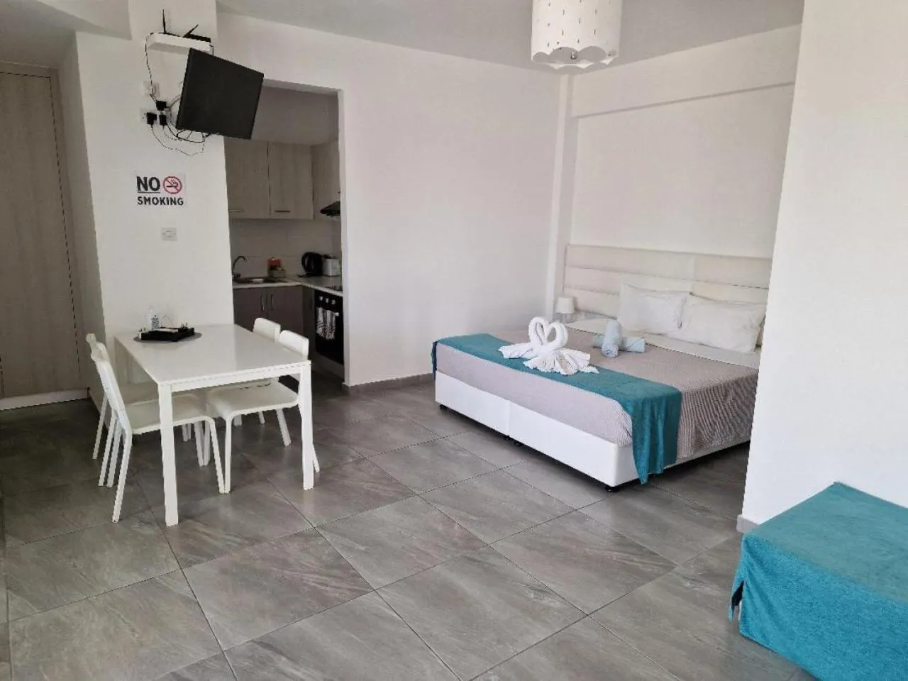 Bed in Christopher's Sandy Beach Suites