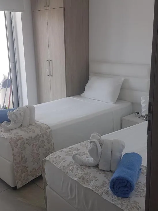 Bed in Christopher's Sandy Beach Suites