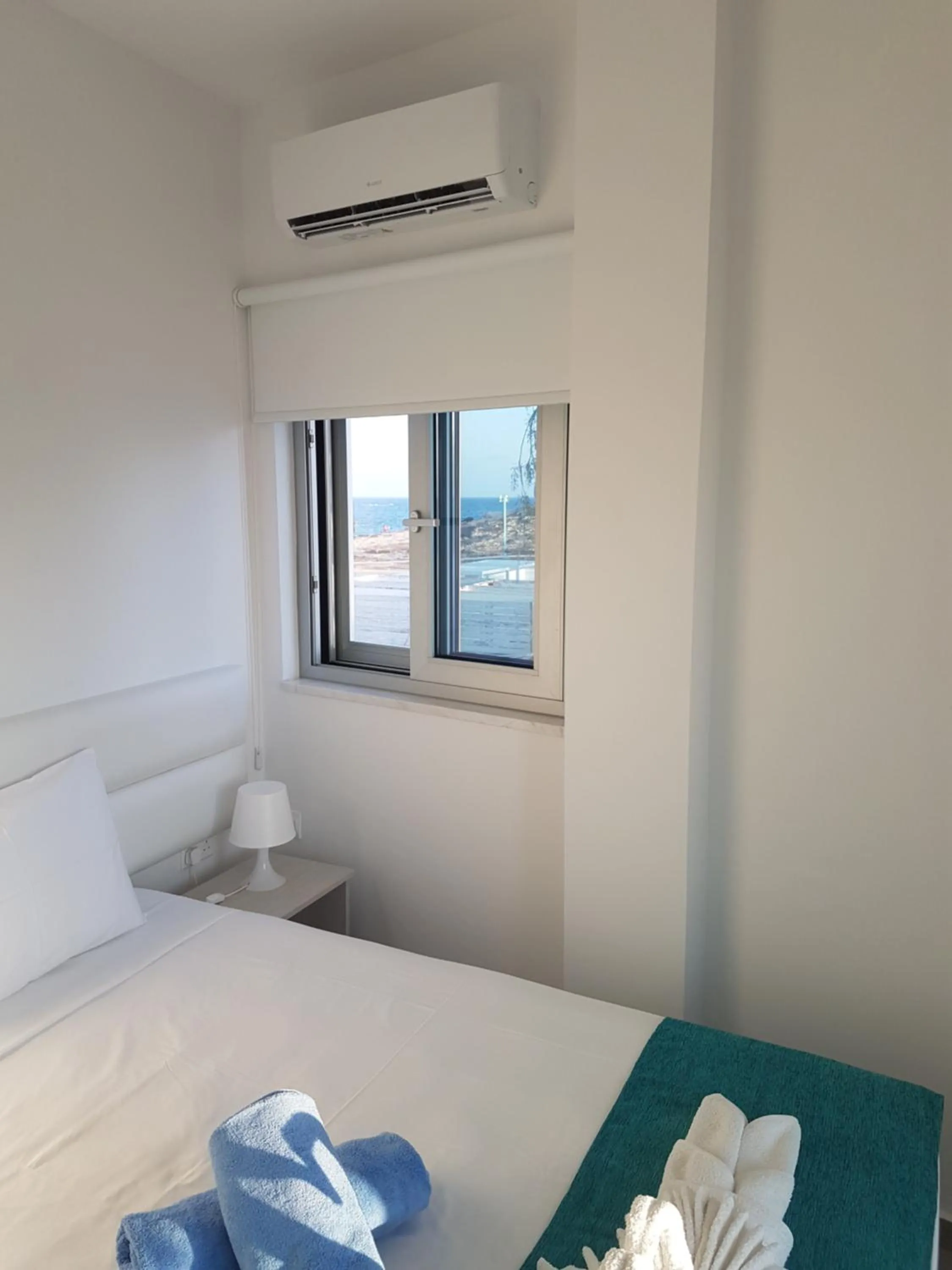 Bed in Christopher's Sandy Beach Suites