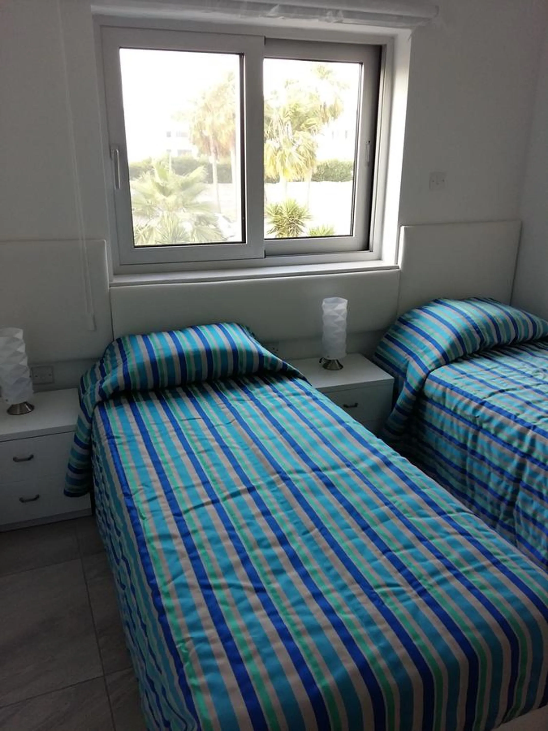 Bed in Christopher's Sandy Beach Suites