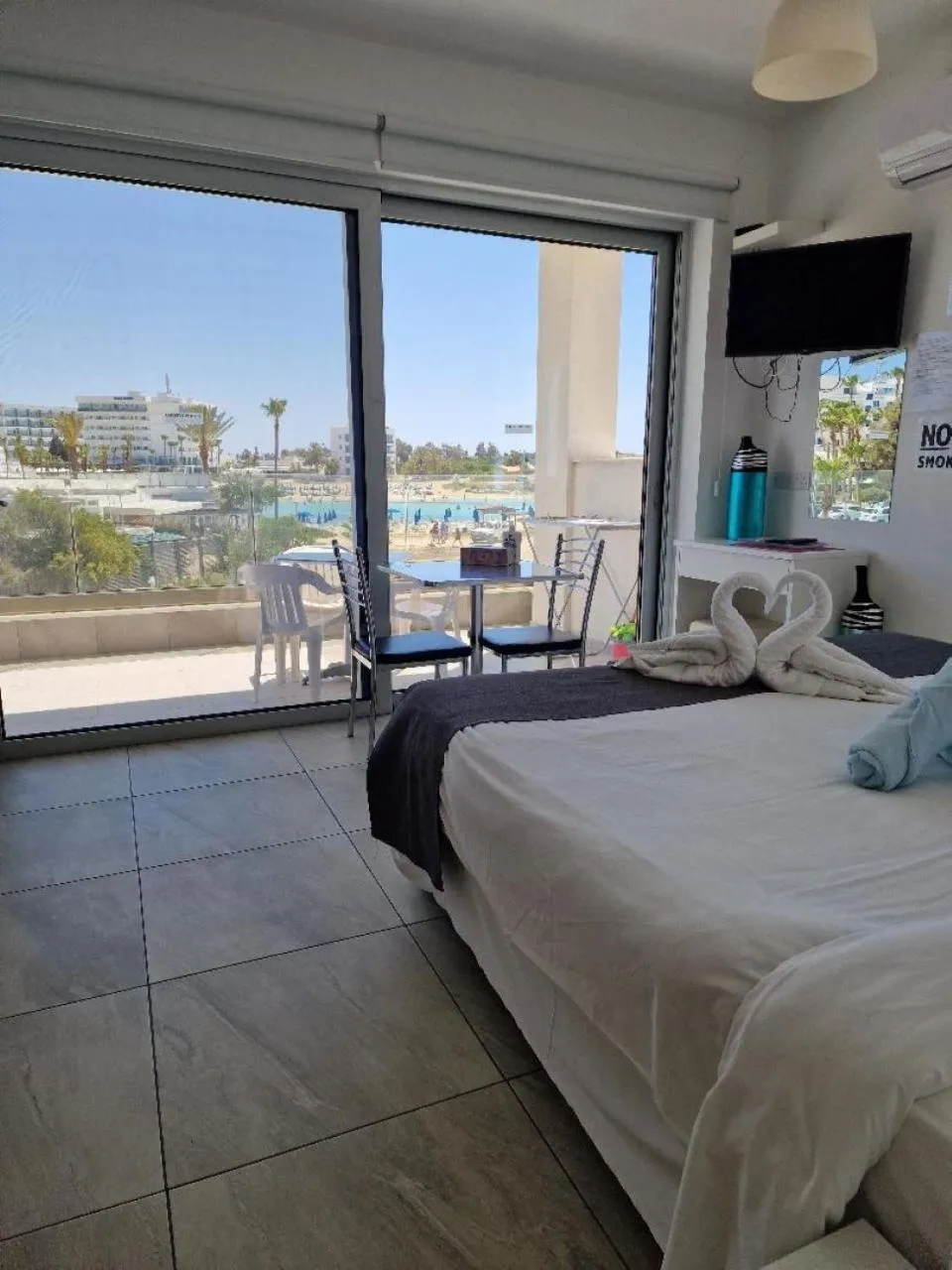 Bed in Christopher's Sandy Beach Suites