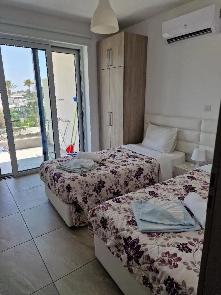 Bed in Christopher's Sandy Beach Suites