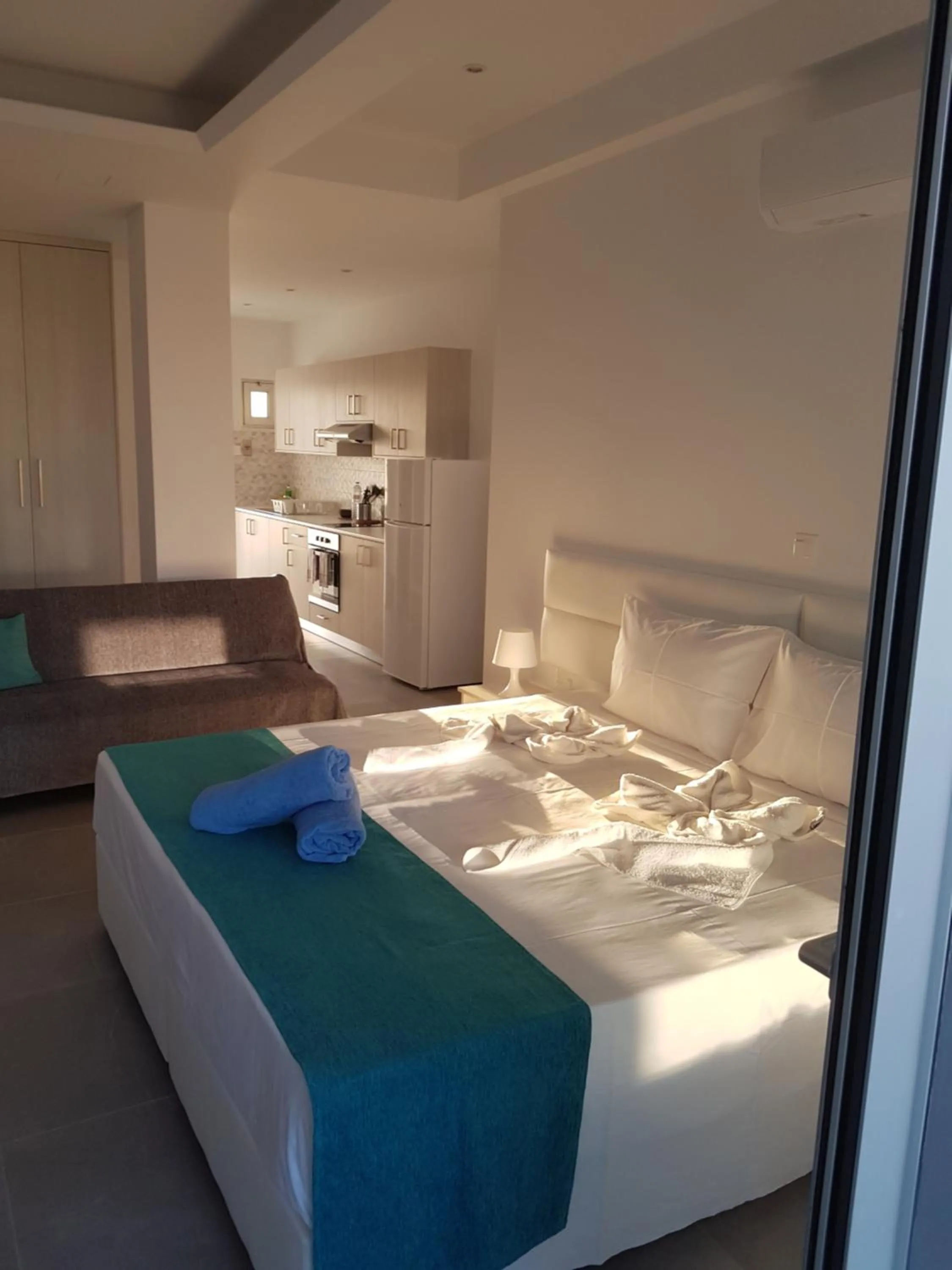 Bed in Christopher's Sandy Beach Suites