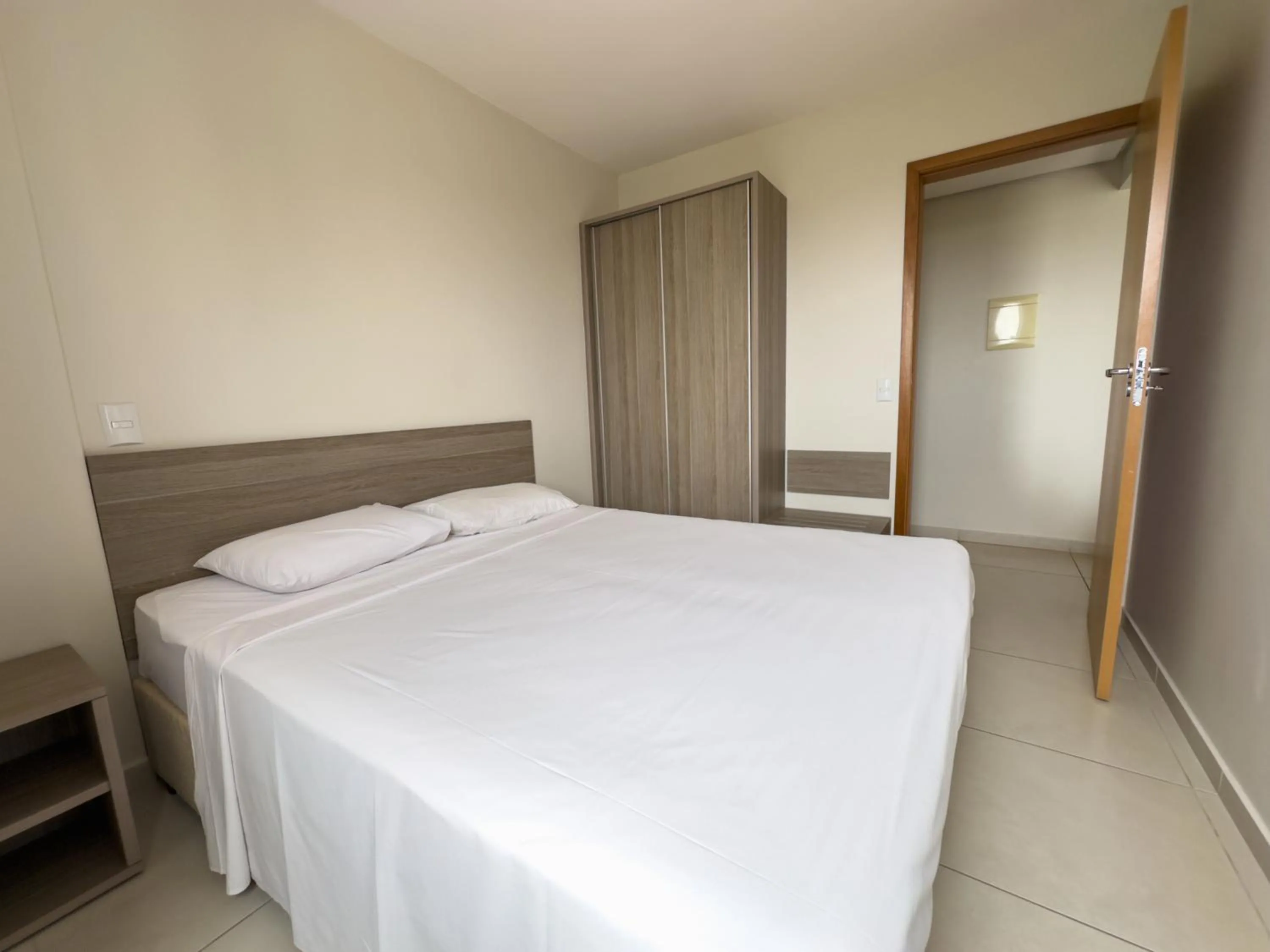 Bedroom, Bed in Atrium Thermas - OFICIAL