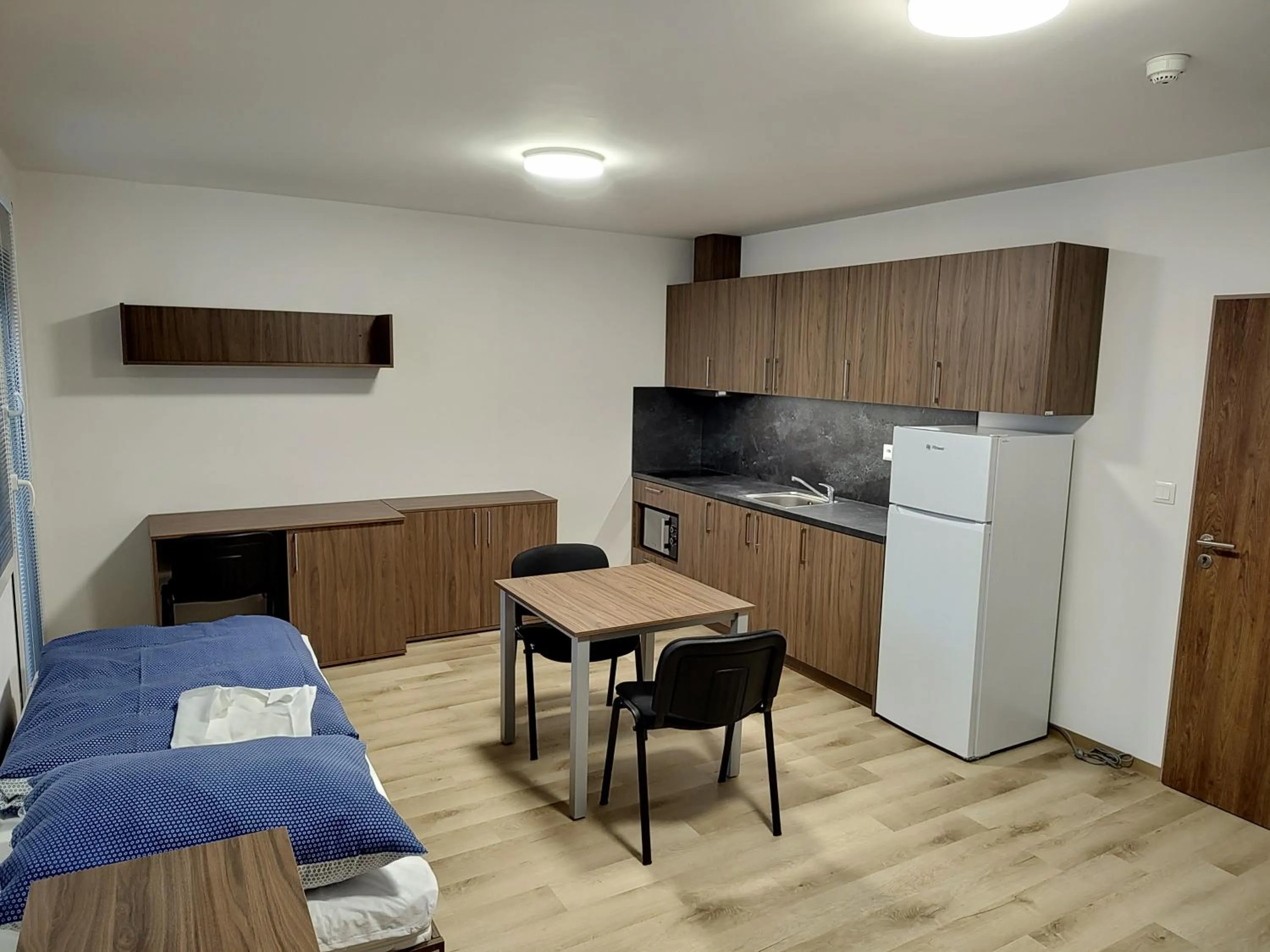 Kitchen or kitchenette, Bed in Hostel Blanice