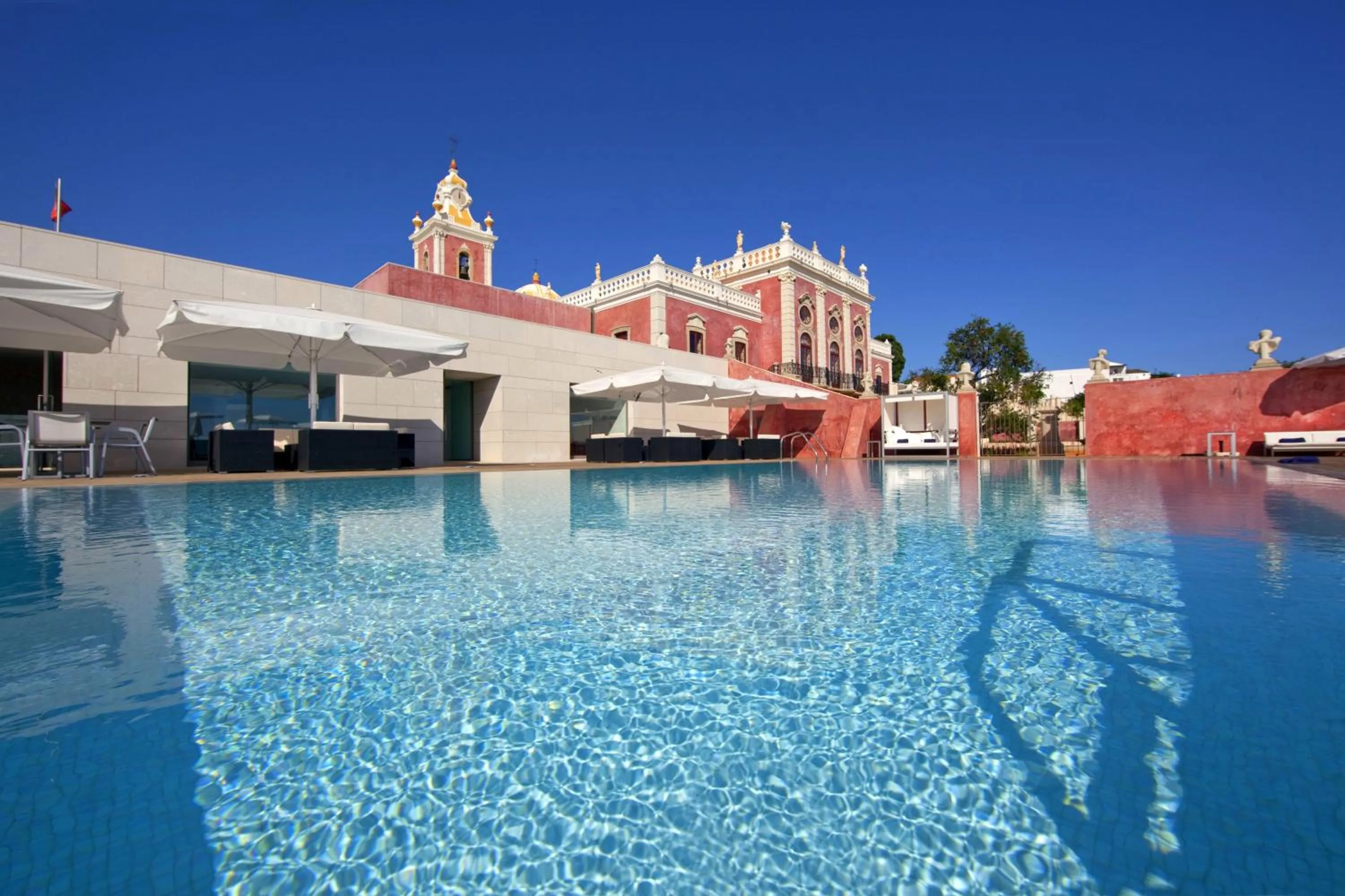 Swimming pool in Pousada Palacio de Estoi – Small Luxury Hotels of the World