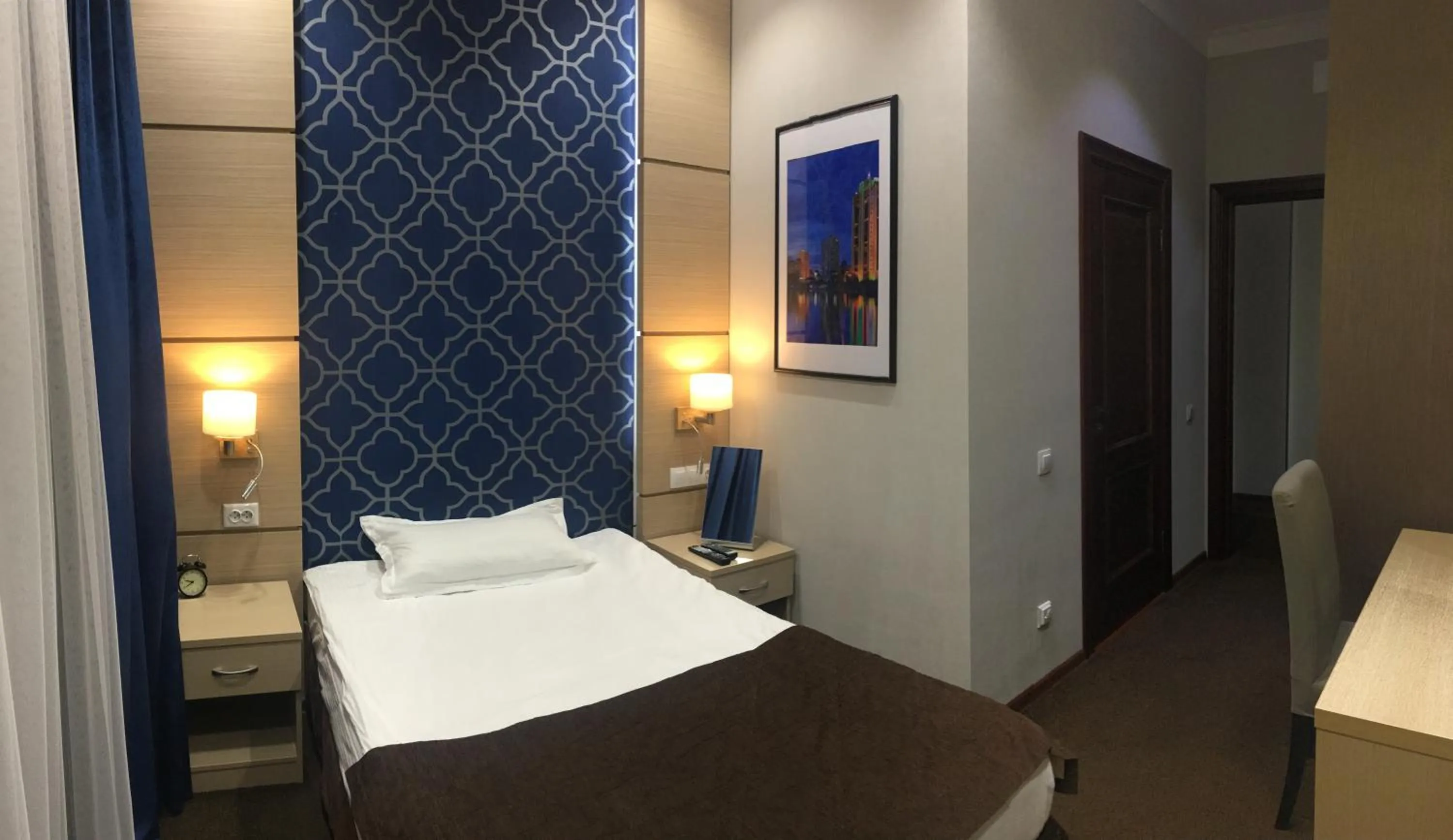 Bed in Orynbor Boutique Hotel