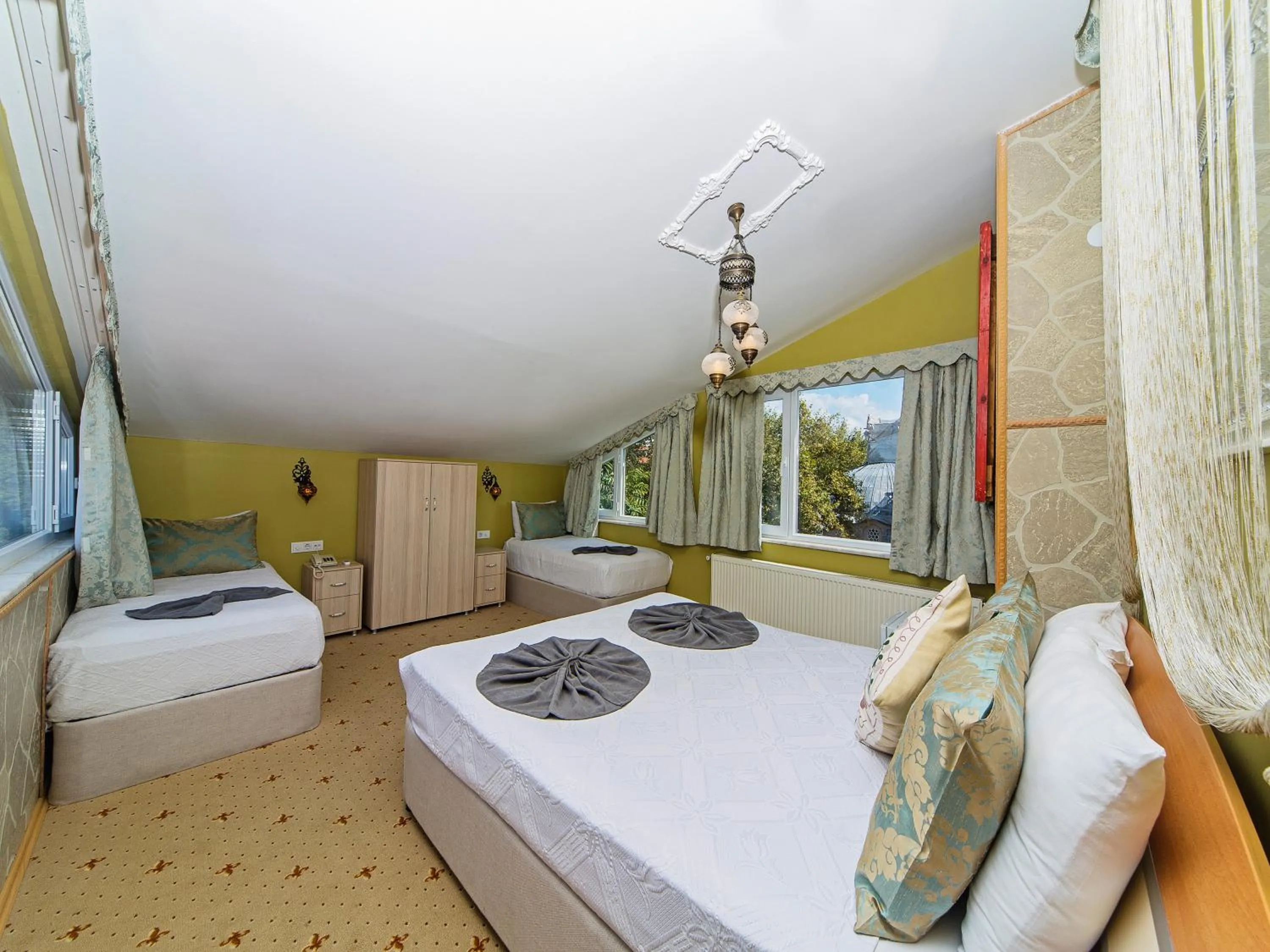 Photo of the whole room, Bed in Modern Sultan Hotel