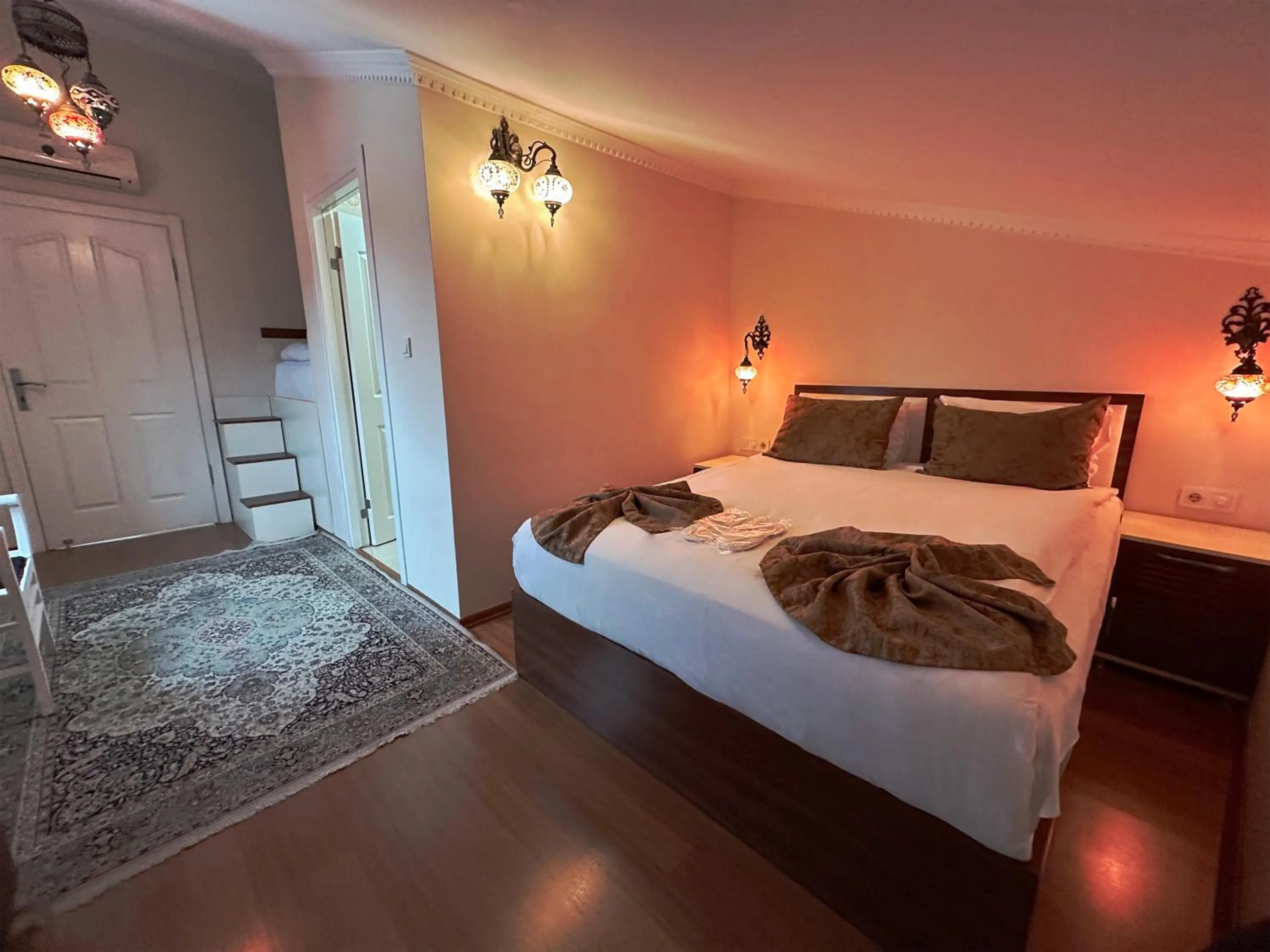 Photo of the whole room, Bed in Modern Sultan Hotel