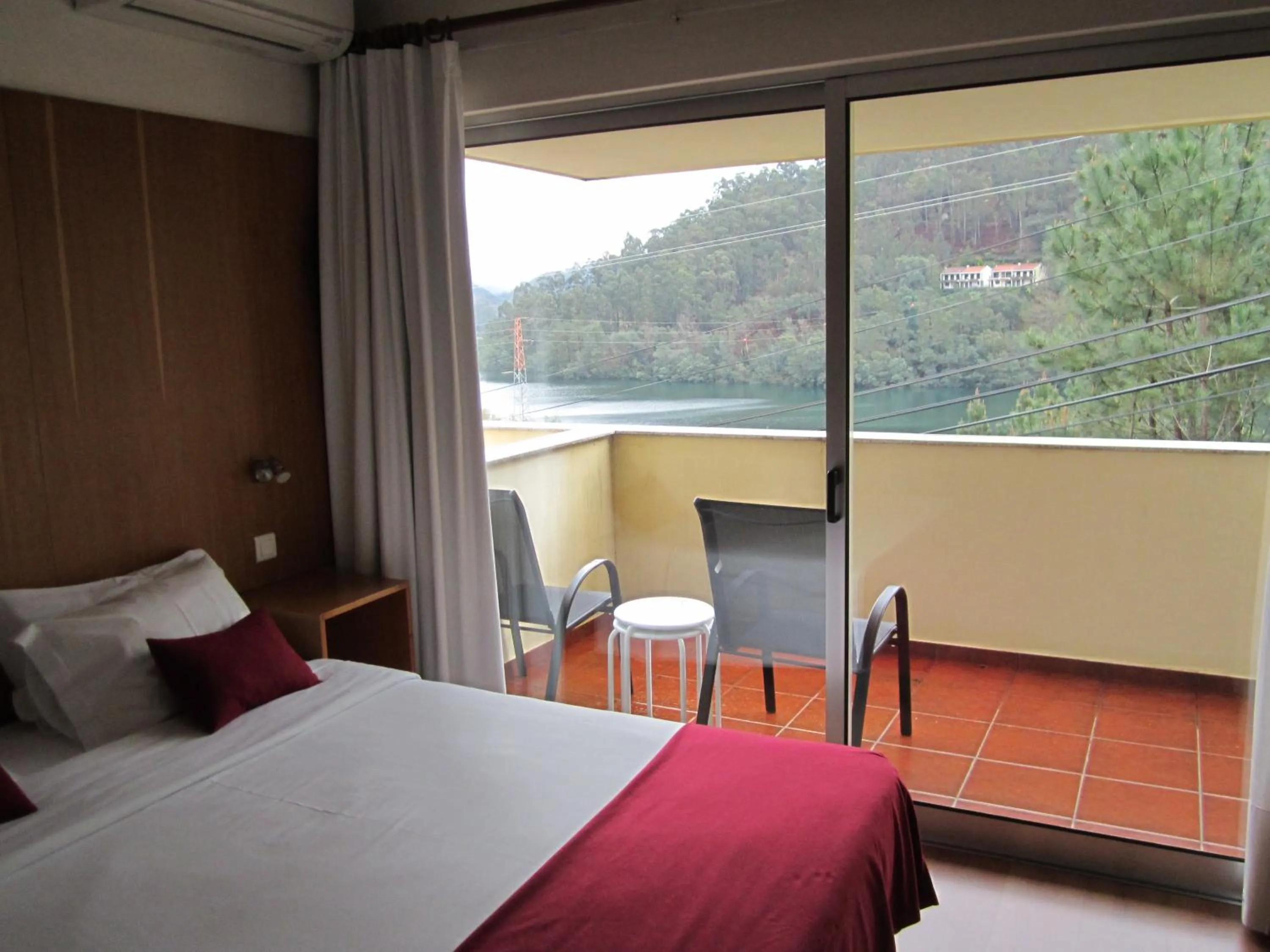 View (from property/room), Bed in Hotel Eco Salvador
