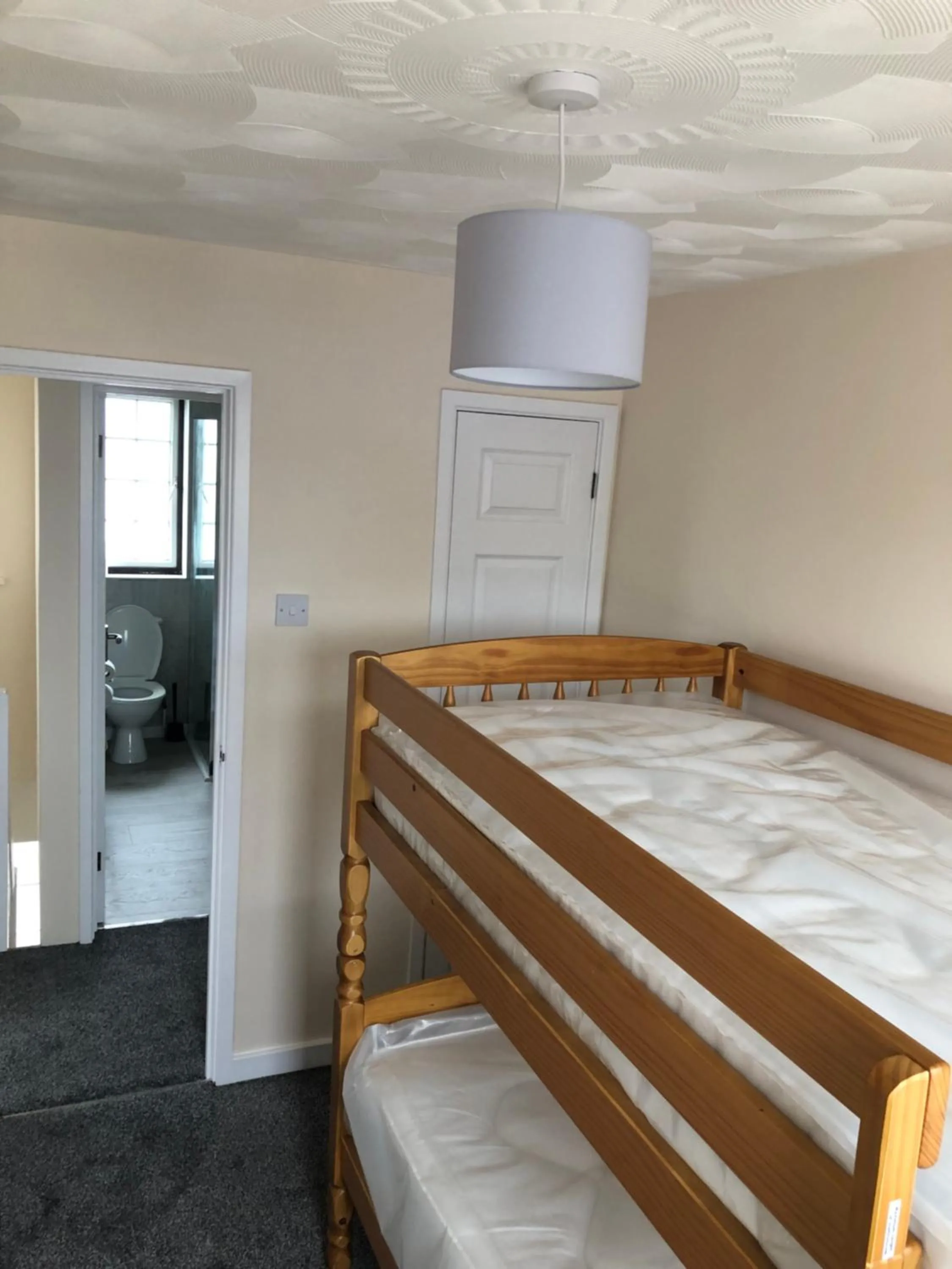 Bedroom in Highgate Inn Hotel