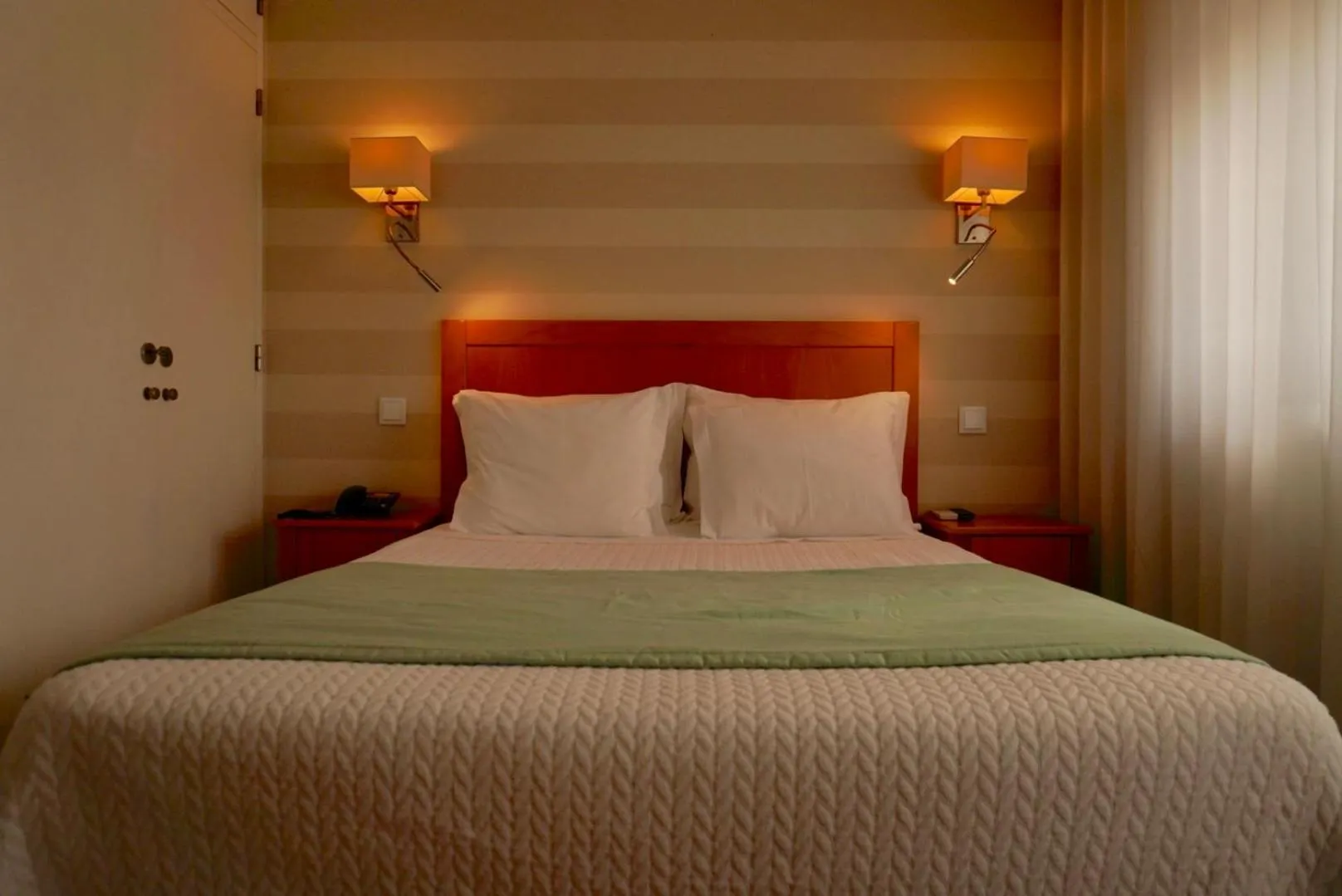 Bed in Hotel Dom Lourenco