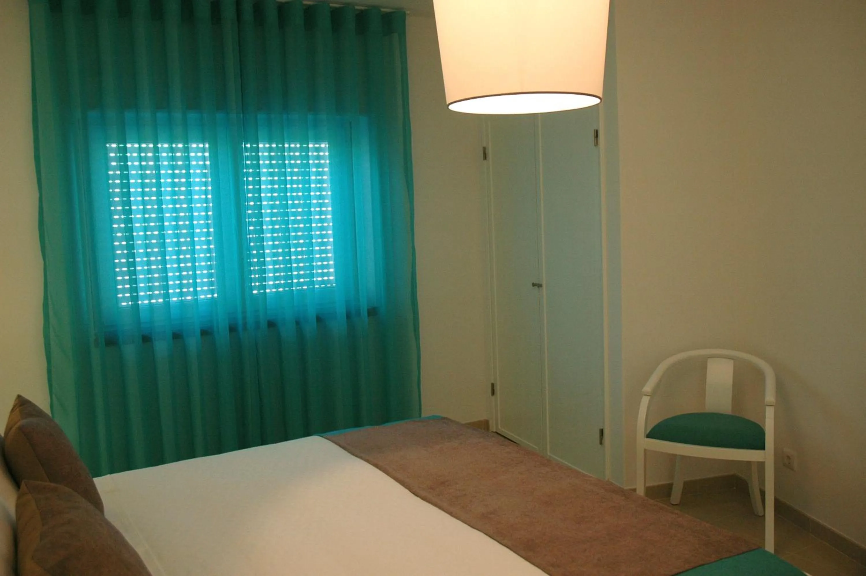 Bed in Hotel Dom Lourenco