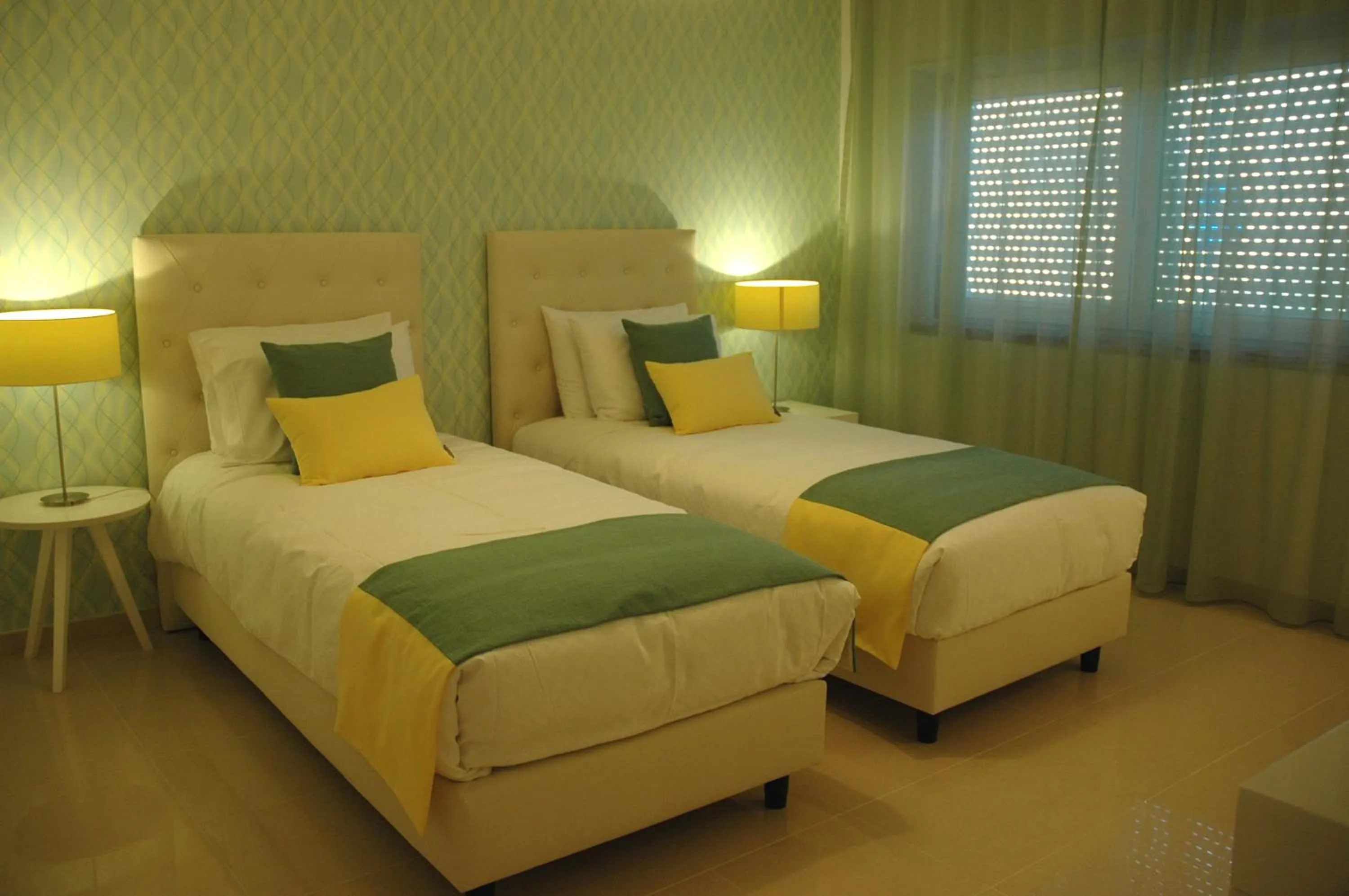 Bed in Hotel Dom Lourenco