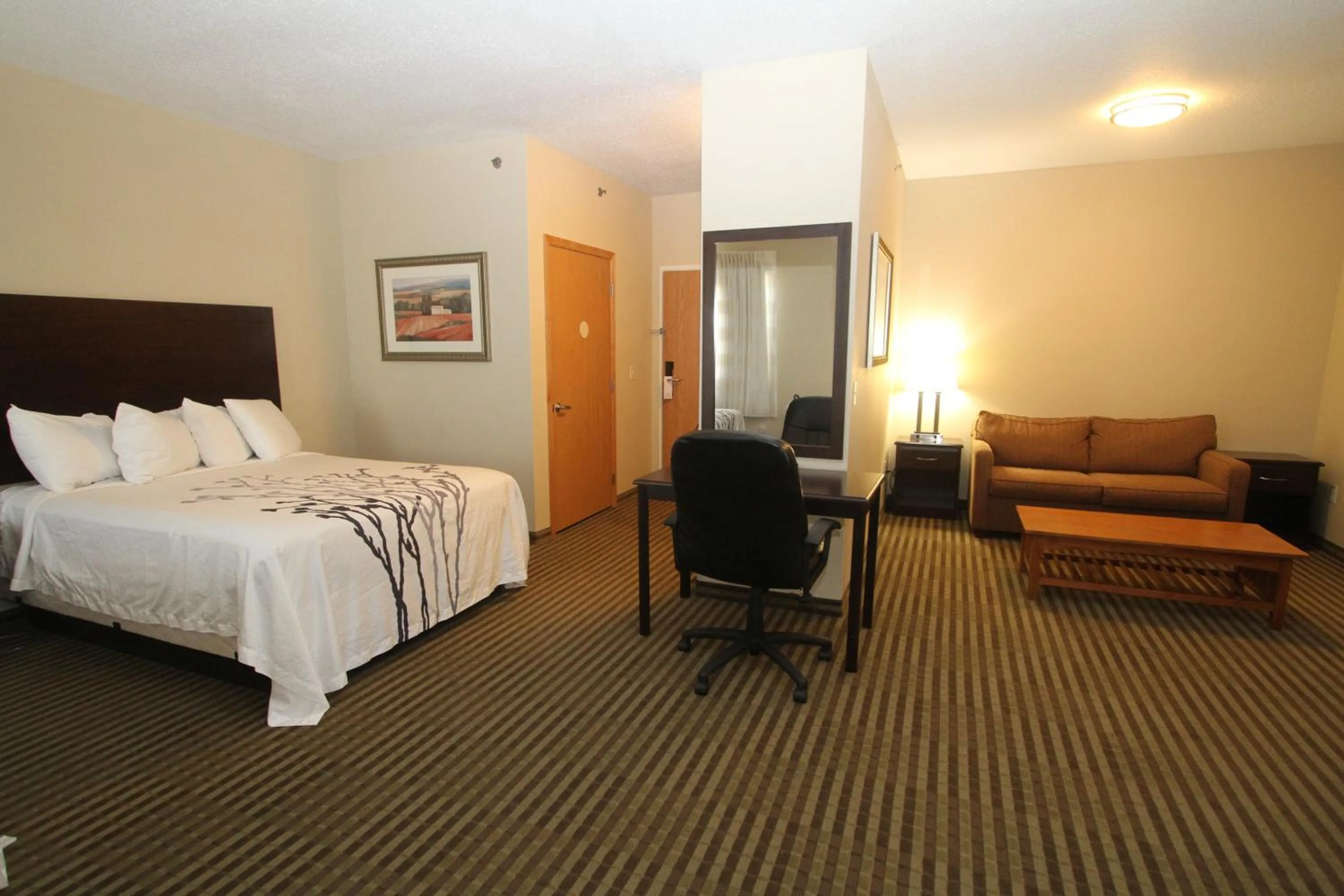 Bed in Bowman Inn and Suites