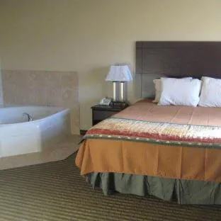 Bed in Bowman Inn and Suites