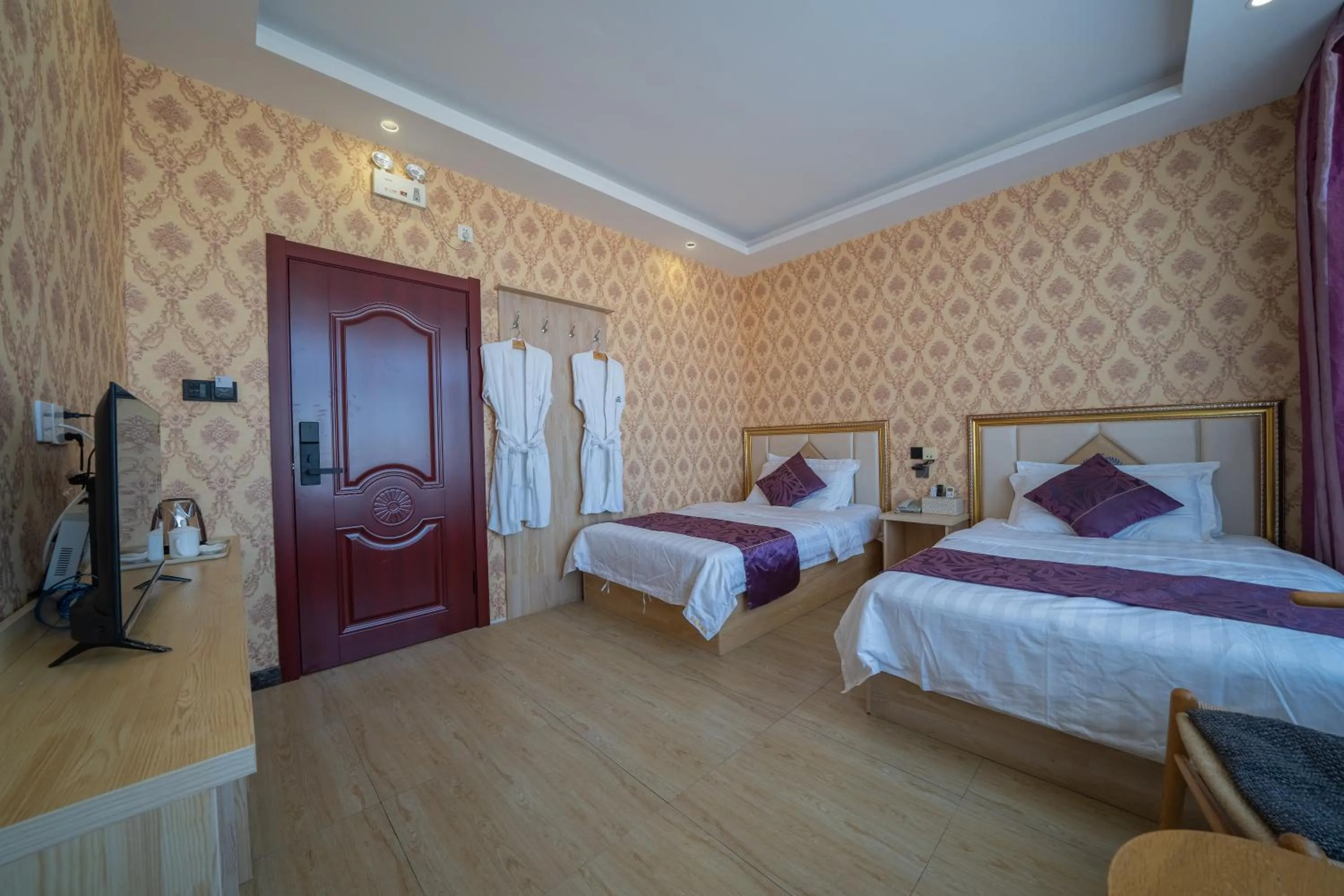 Bed in XinQihang Hotel Harbin Taiping Airport