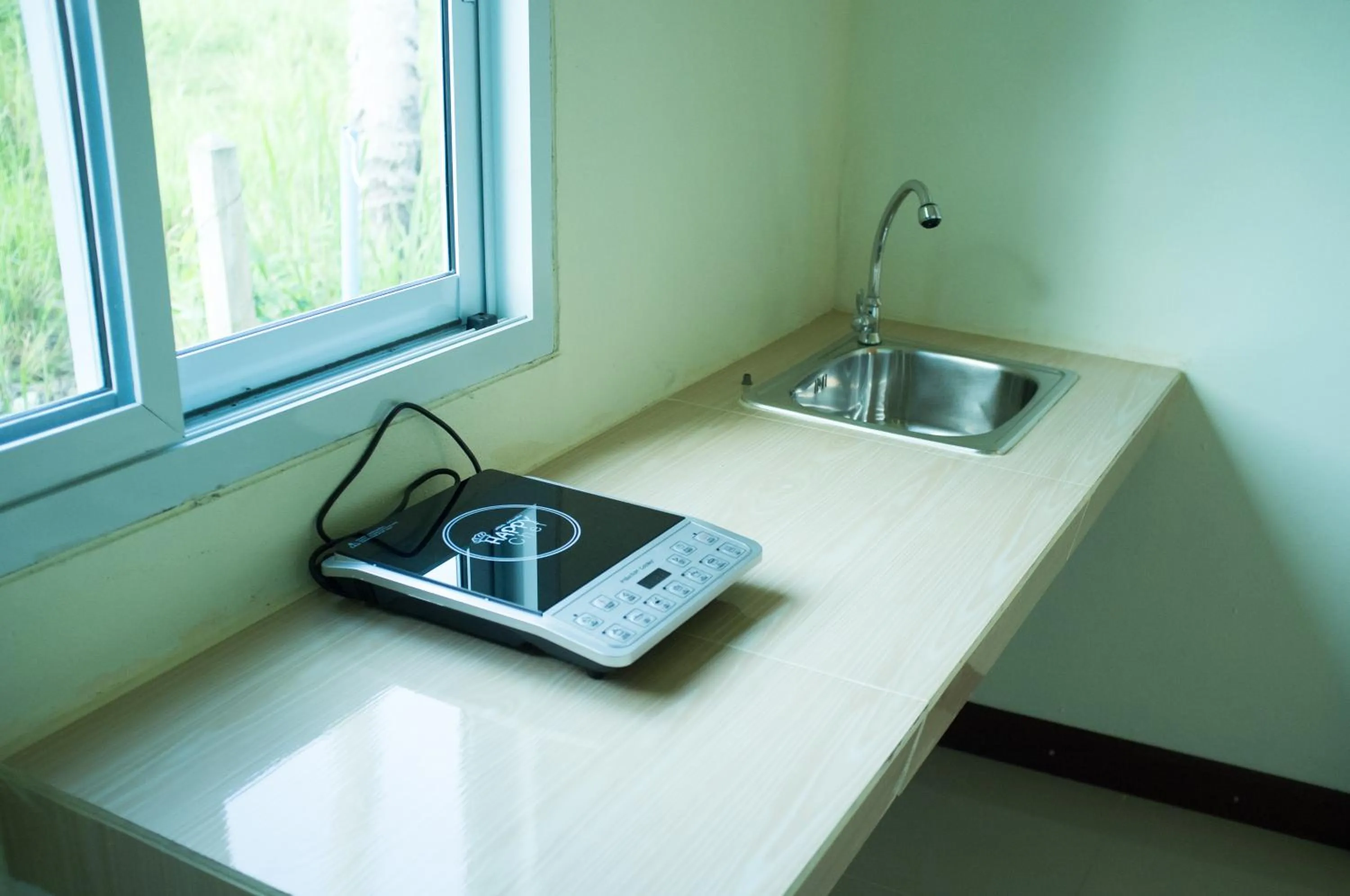 Communal kitchen in Everest Resort Samui - SHA Plus