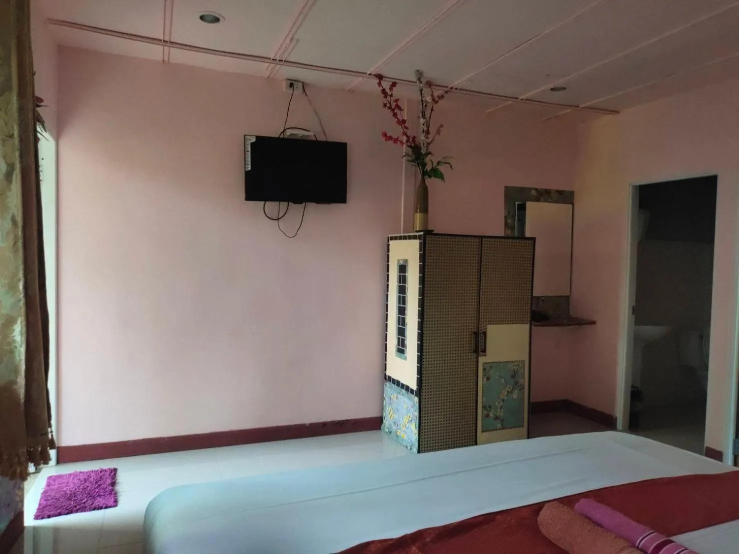 Bed in Everest Resort Samui - SHA Plus