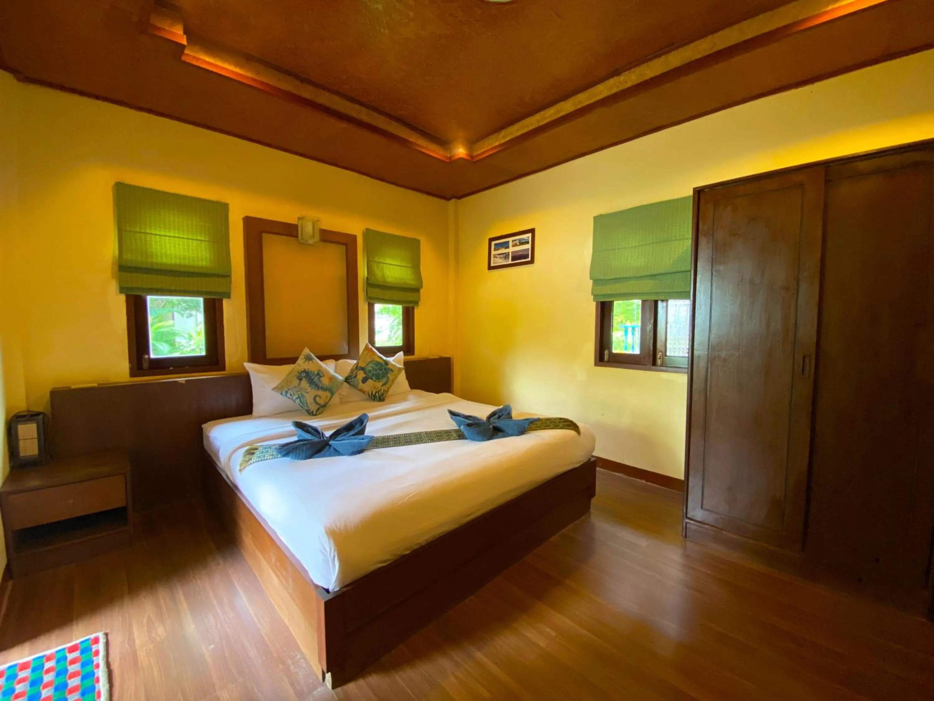 Bed in Everest Resort Samui - SHA Plus