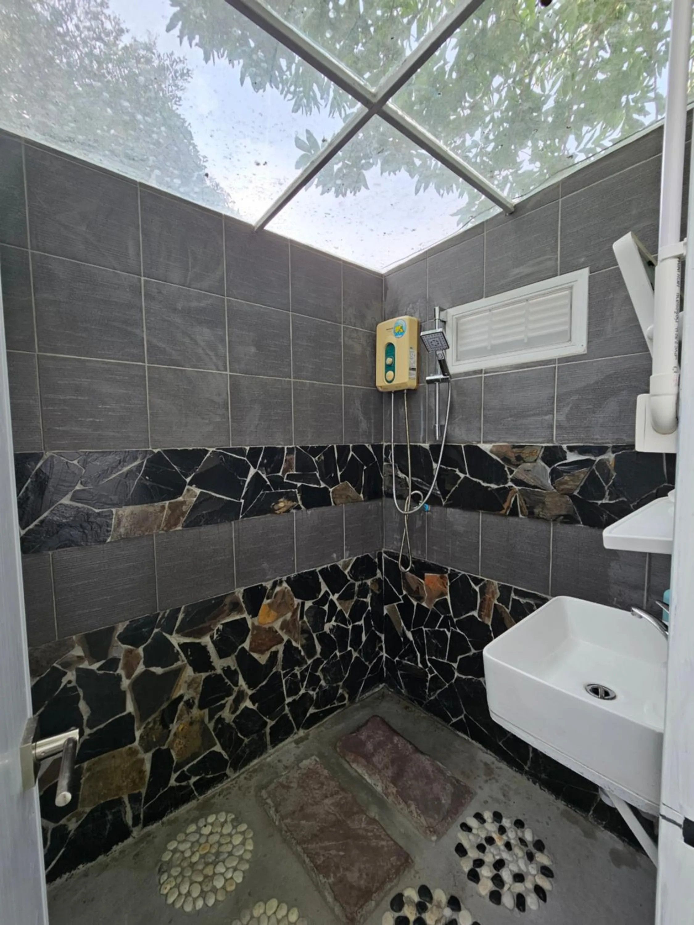 Shower in Everest Resort Samui - SHA Plus