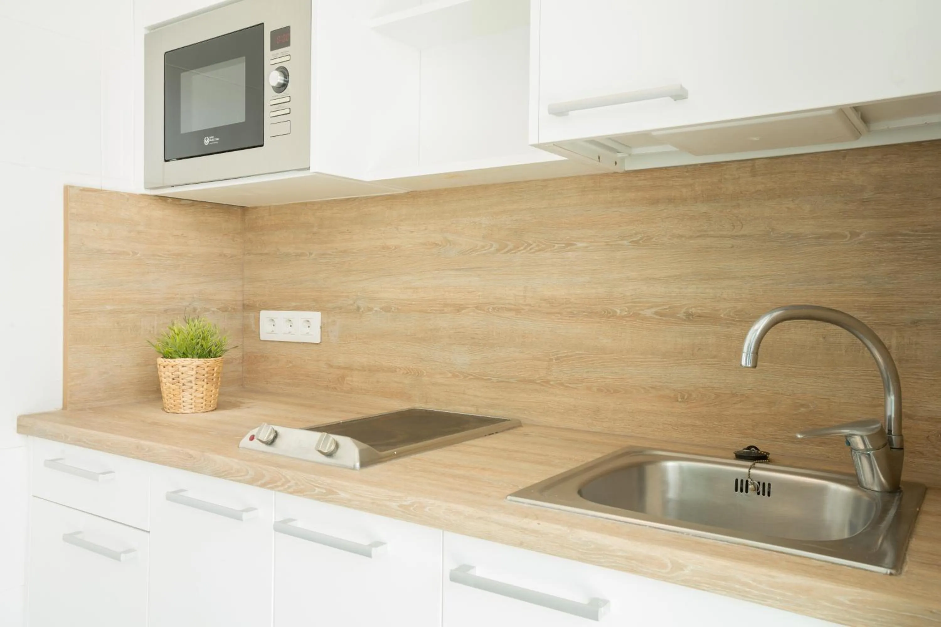 Kitchen or kitchenette in Bungalows Doña Rosa