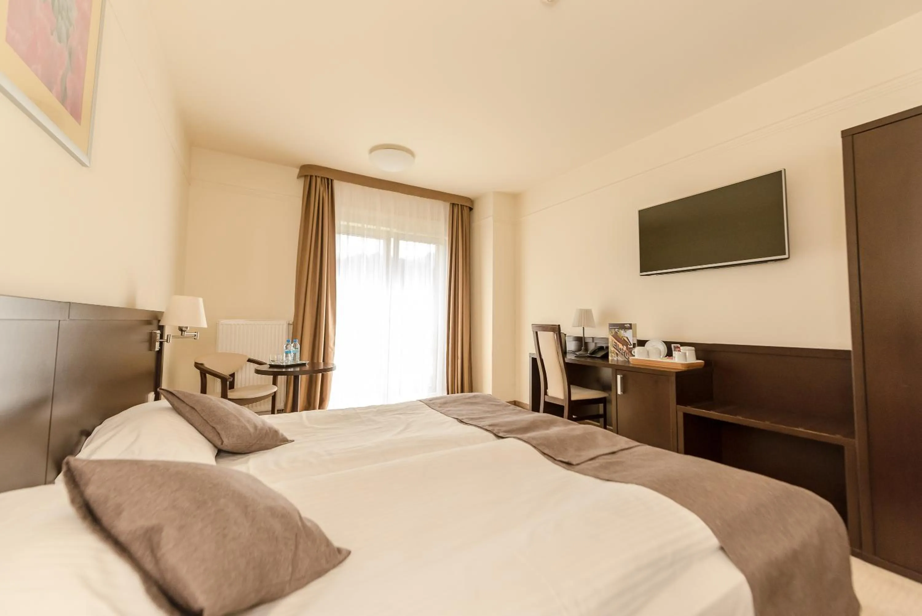 Bed in Hotel Elbrus Spa & Wellness