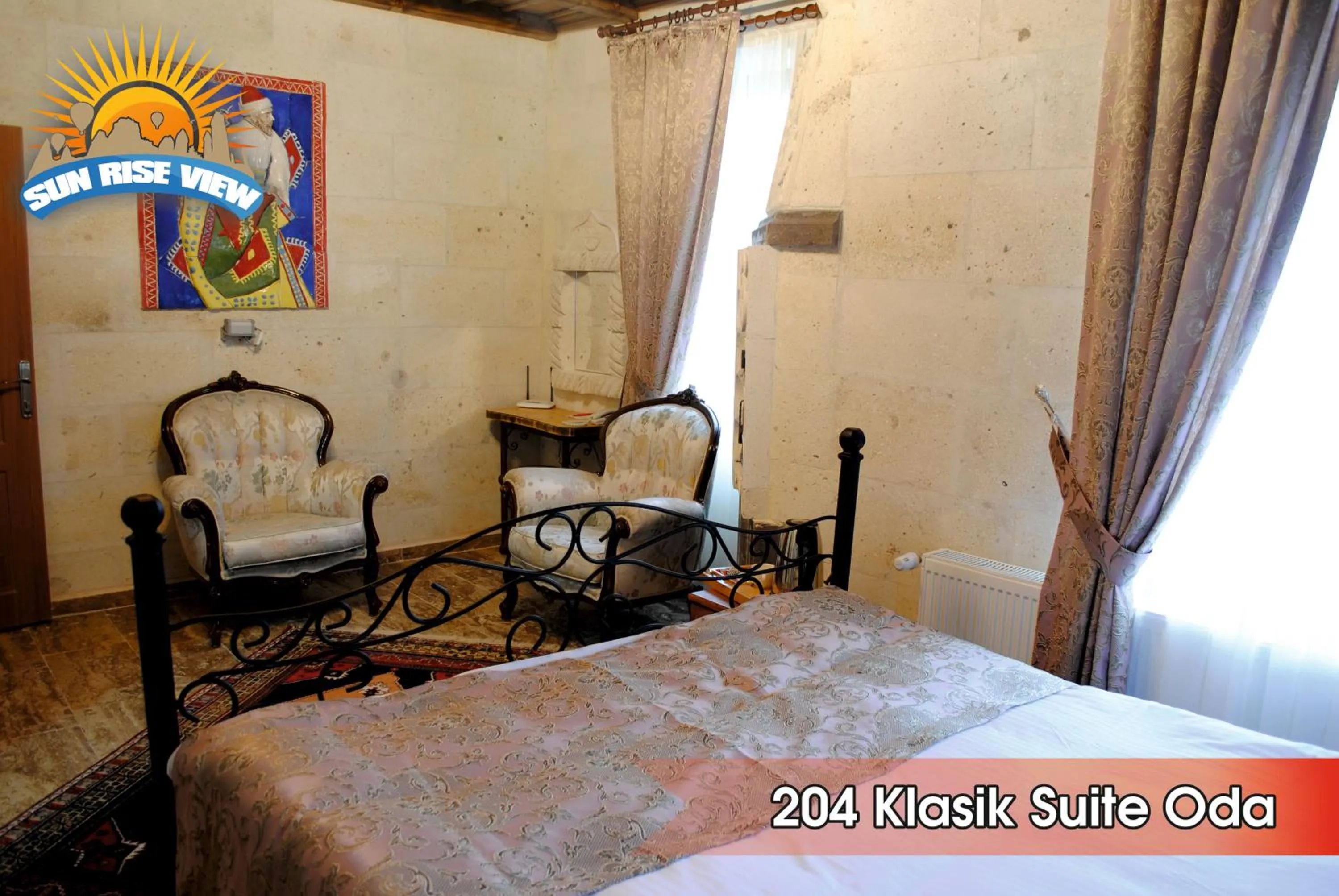 Seating area, Bed in Sun Rise View Hotel