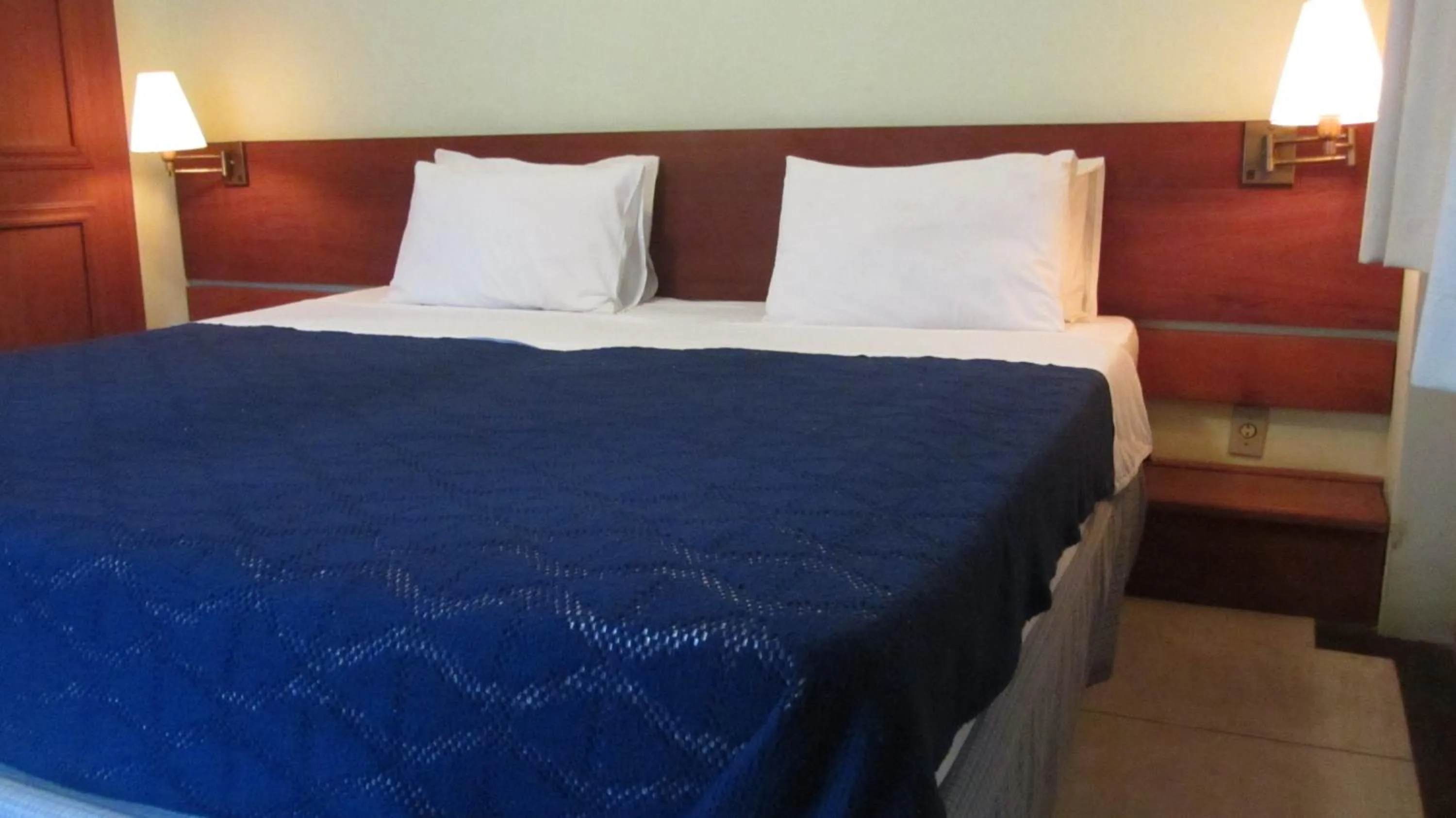 Bed in Pousada Pilar