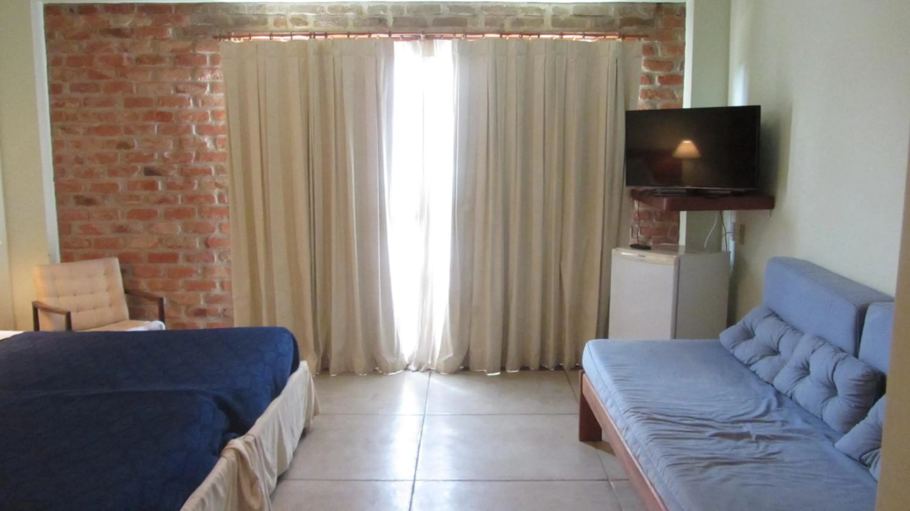 Bed in Pousada Pilar