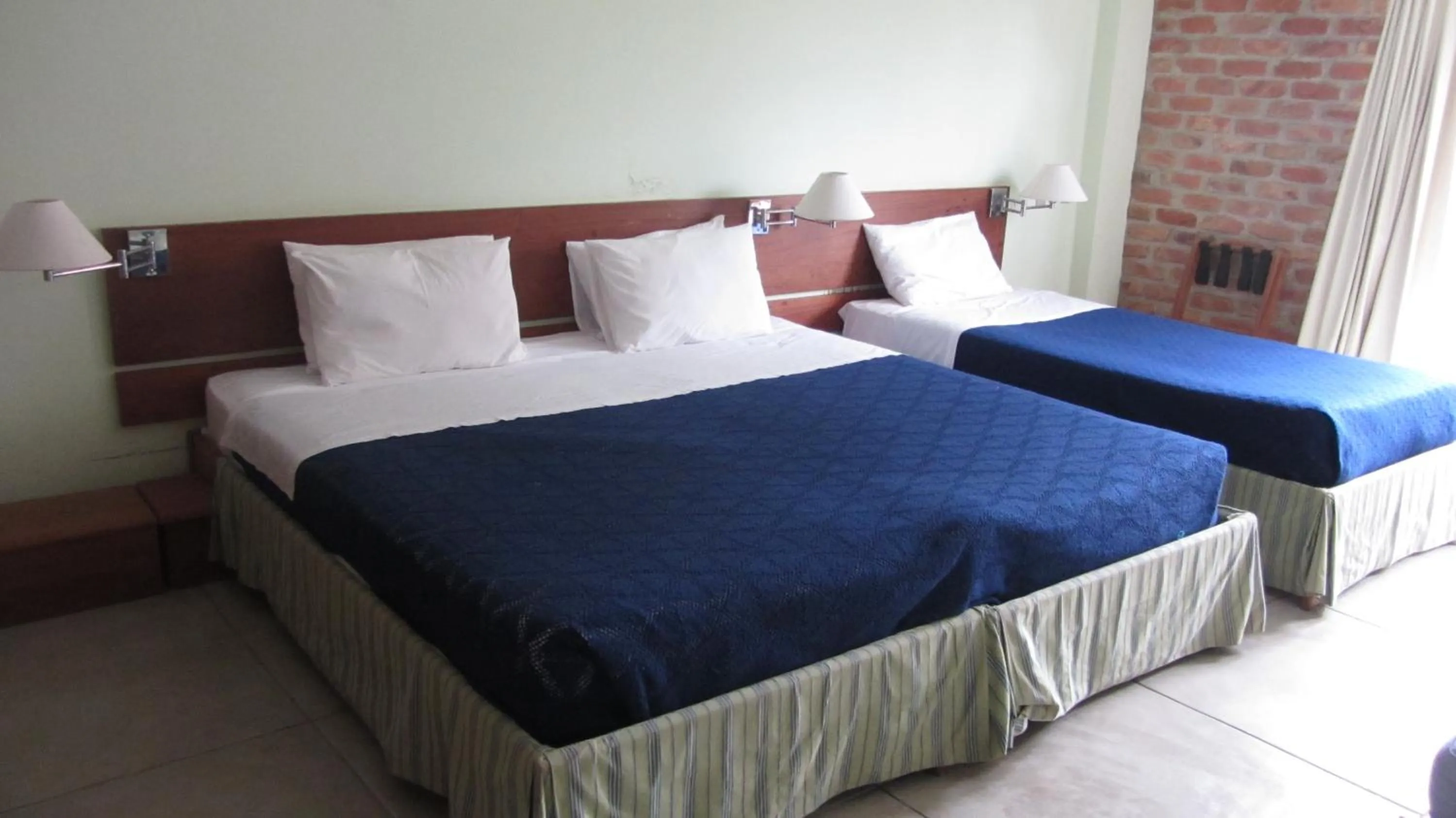 Bed in Pousada Pilar