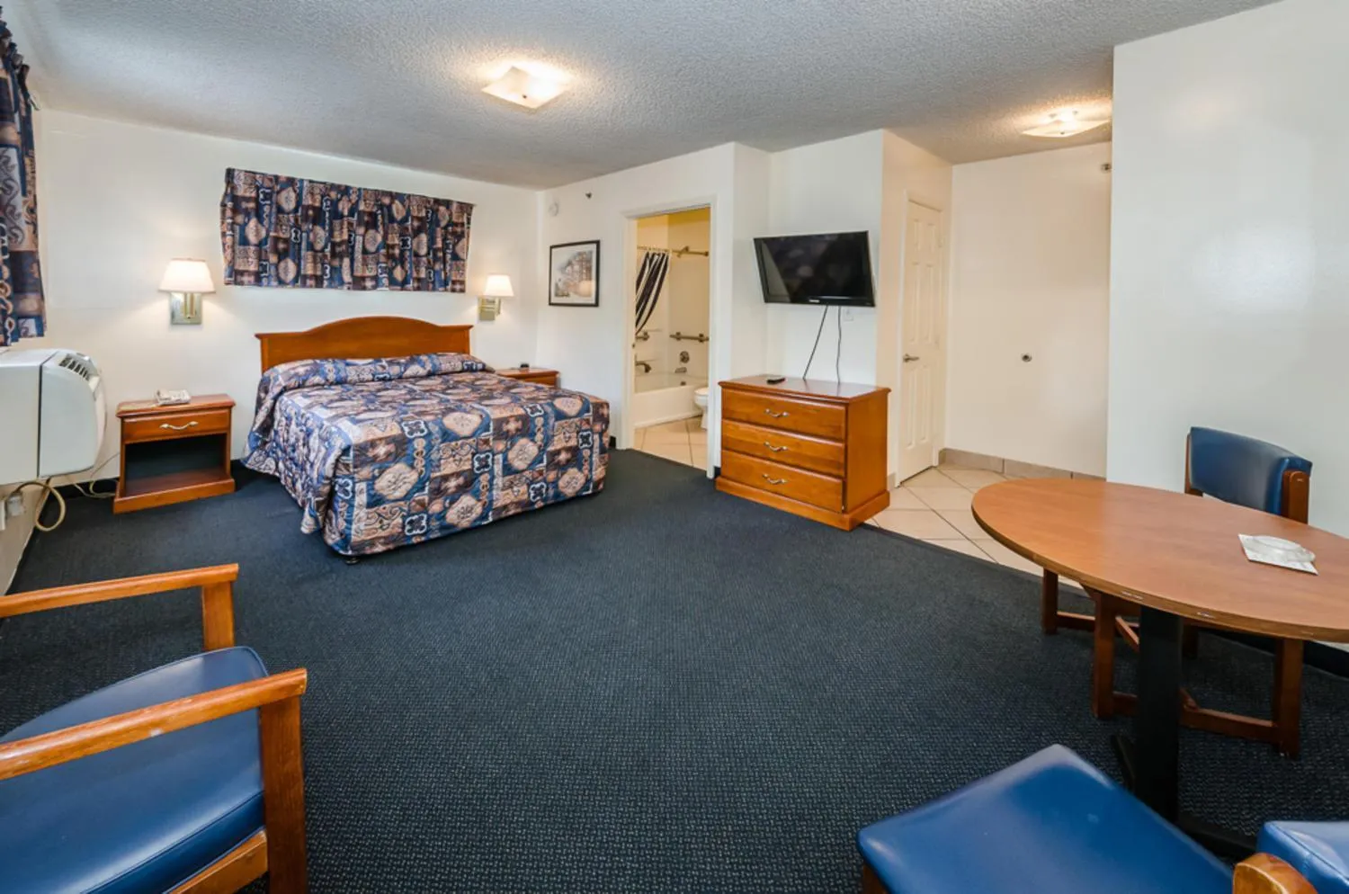 Bed in Tampa Bay Extended Stay Hotel