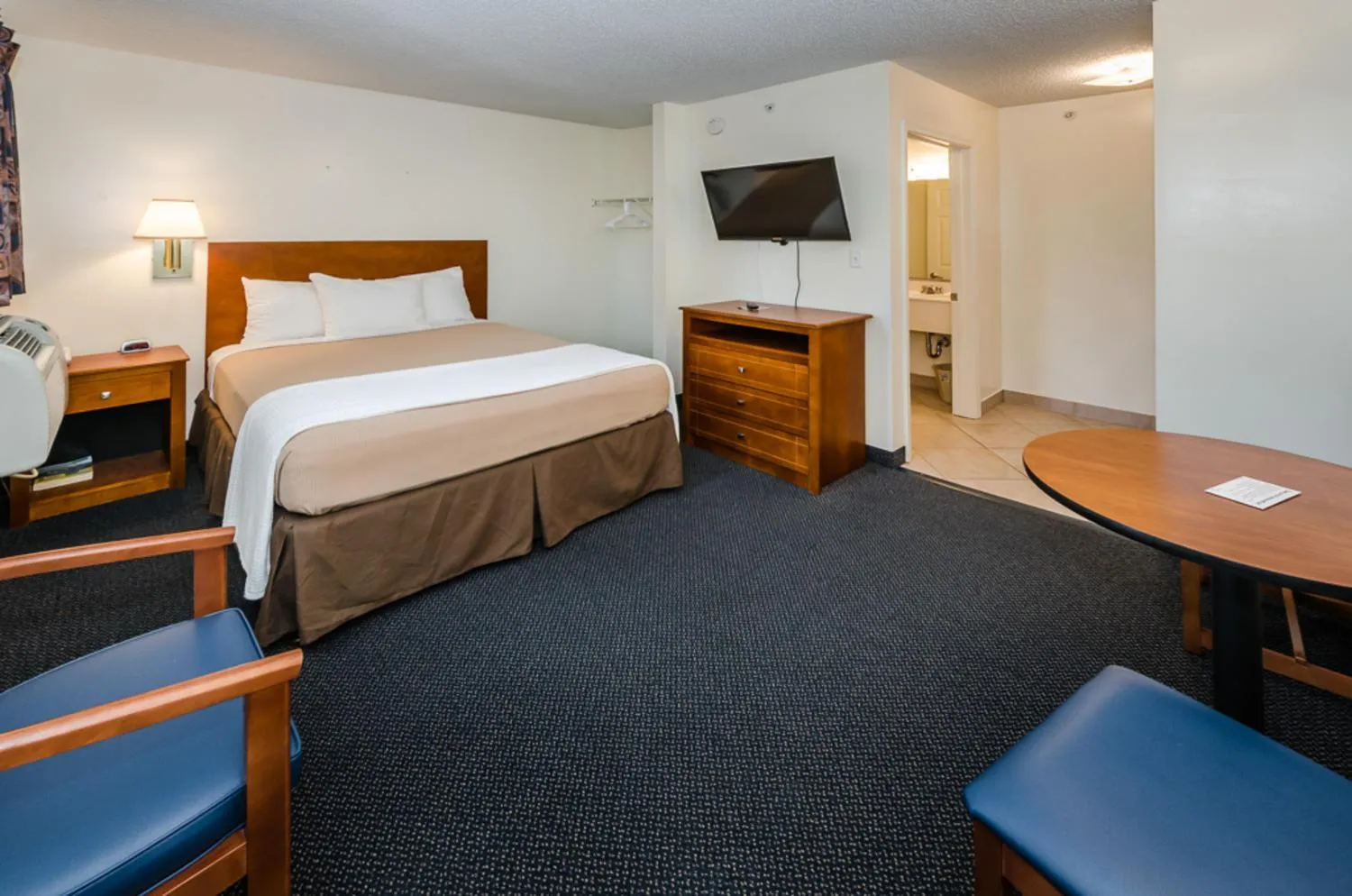 Bed in Tampa Bay Extended Stay Hotel