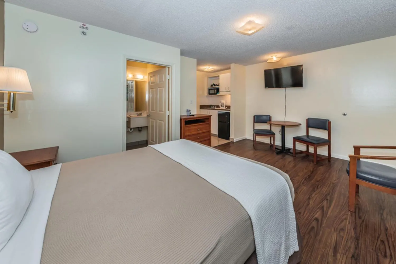 Bed in Tampa Bay Extended Stay Hotel