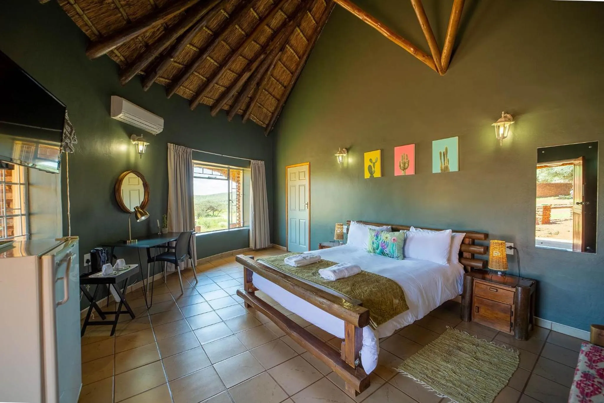 Photo of the whole room, Bed in Red Sands Country Lodge