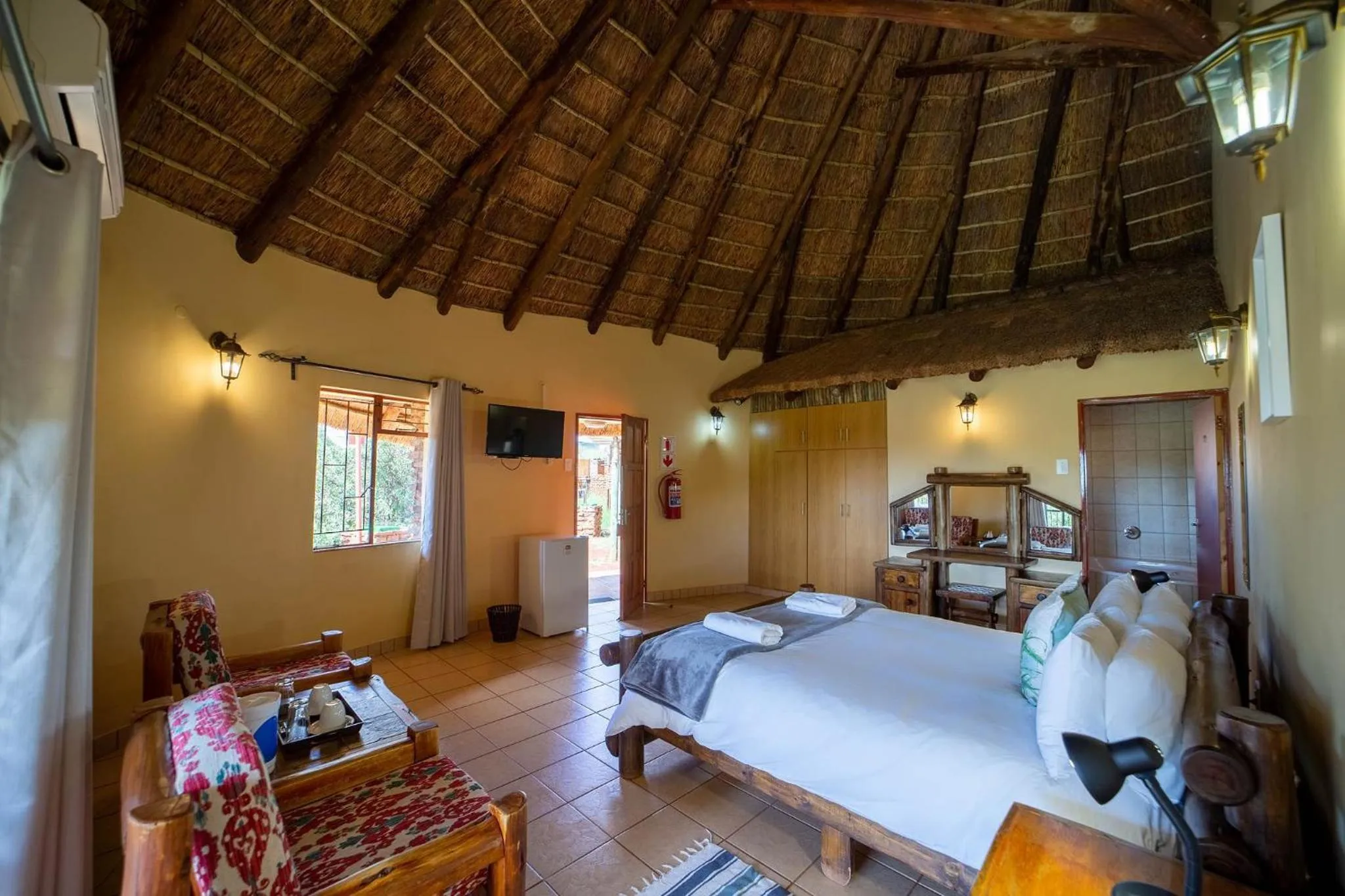 Photo of the whole room, Bed in Red Sands Country Lodge